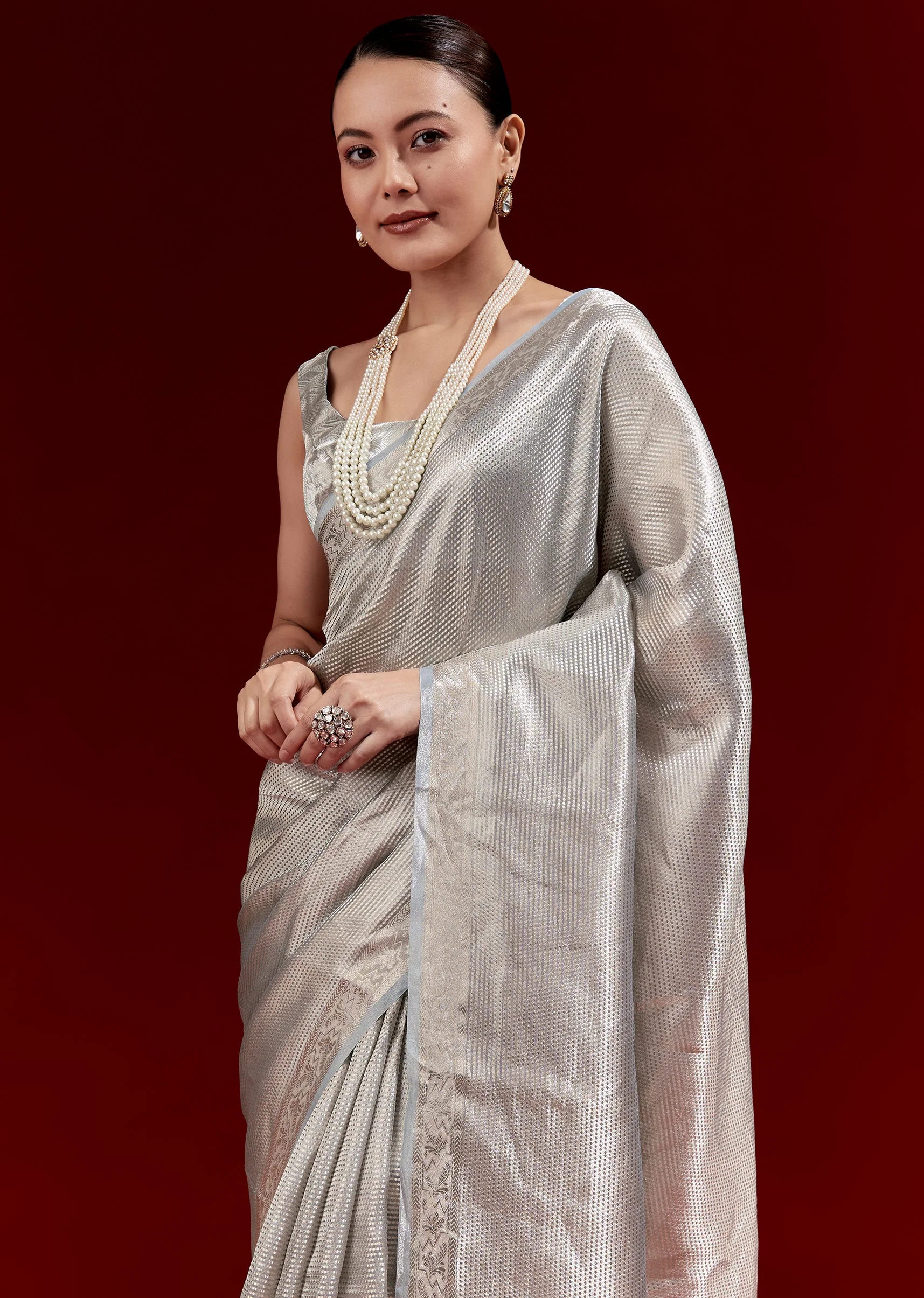 Metallic Blue Banarasi Tissue Saree With Micro Geometric Weave And Floral Woven Border