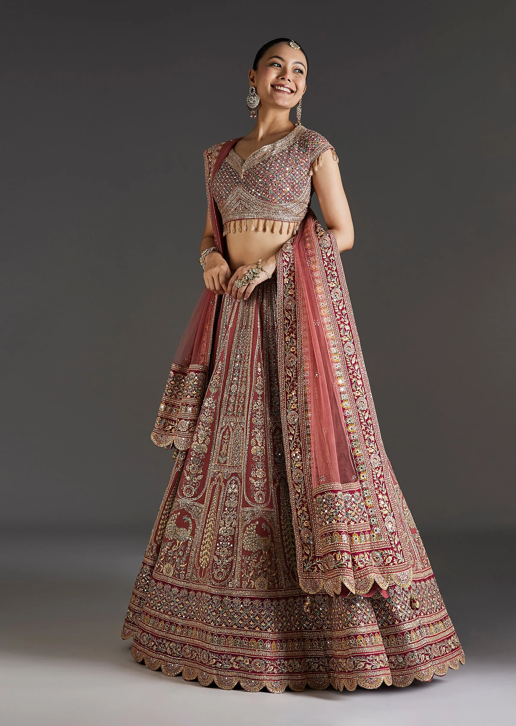 2144-pink-printed-lehenga-with-mirror-and-stone-accents-1.webp Pink Printed Lehenga With Mirror And Stone Accents
