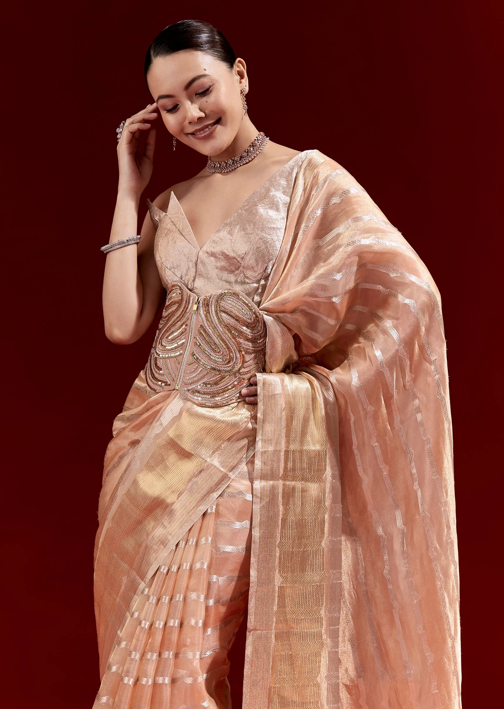Peach Banarasi Tissue Saree With Chanderi Stripes And Embroidered Cutdana Belt
