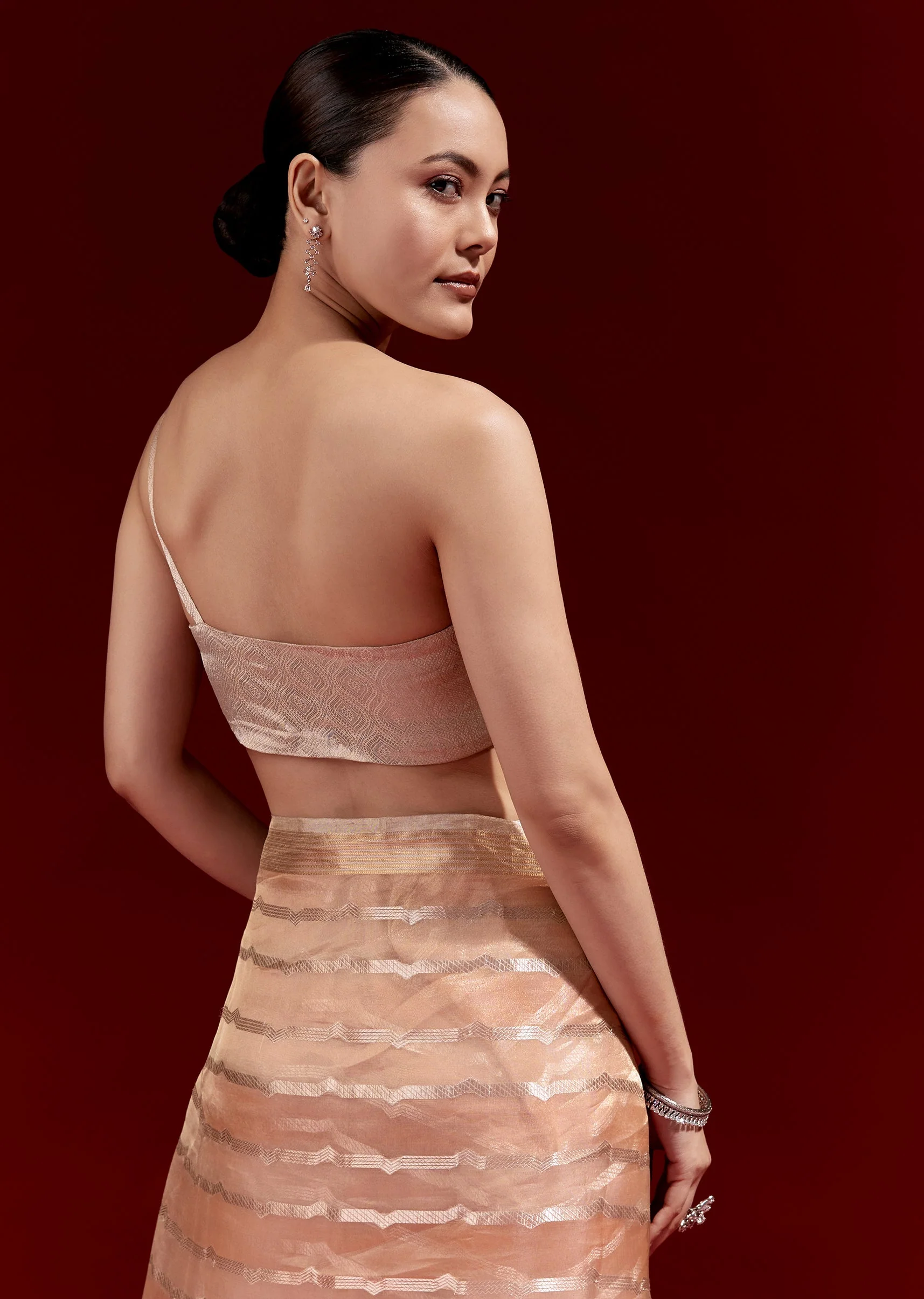 Peach Banarasi Tissue Saree With Chanderi Stripes And Embroidered Cutdana Belt
