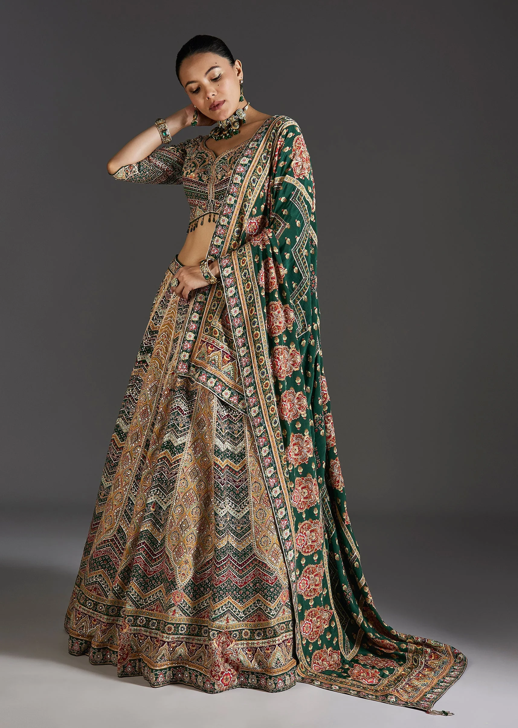 2152-dark-green-lehenga-with-bold-festive-prints-1.webp Dark Green Lehenga With Bold Festive Prints