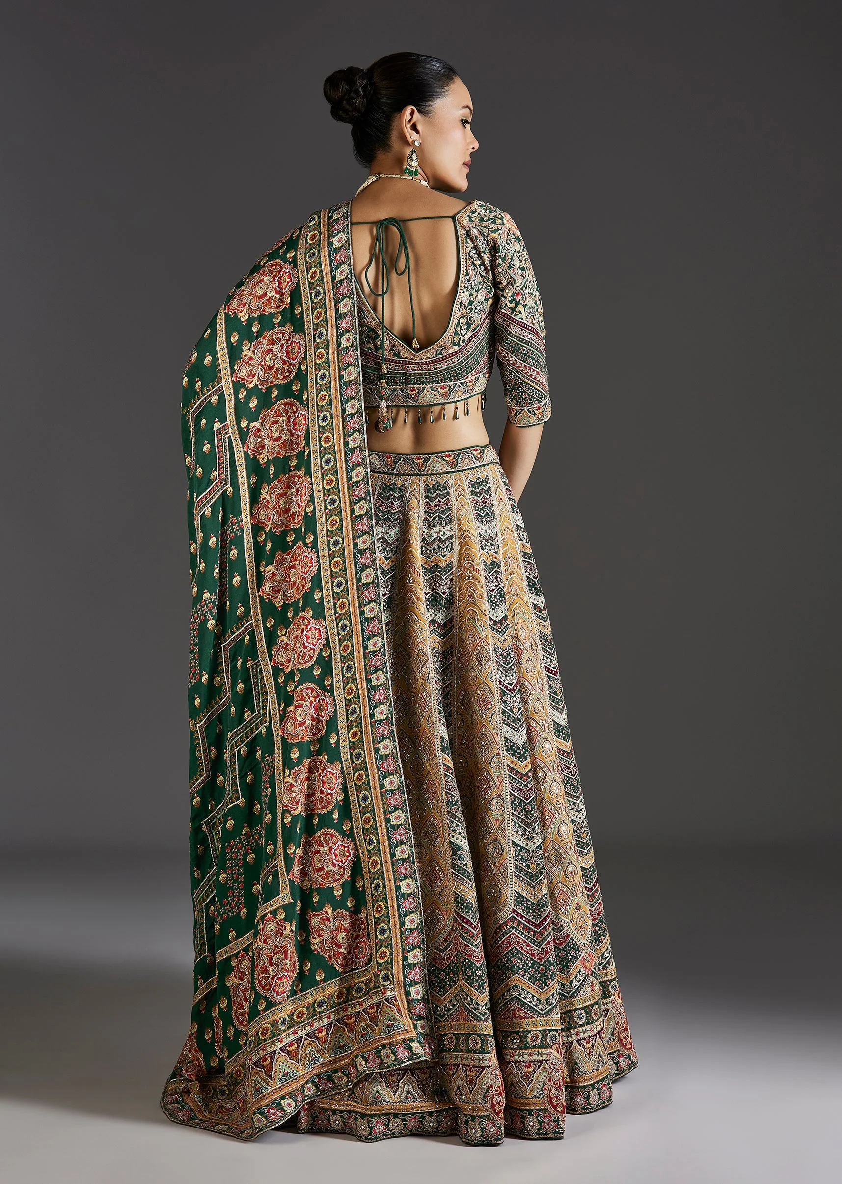 Dark Green Lehenga With Bold Festive Prints