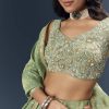 Spa Green Banarasi Silk Bridesmaid Lehenga With Heavy Hand Embroidery
