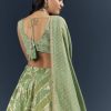 Spa Green Banarasi Silk Bridesmaid Lehenga With Heavy Hand Embroidery