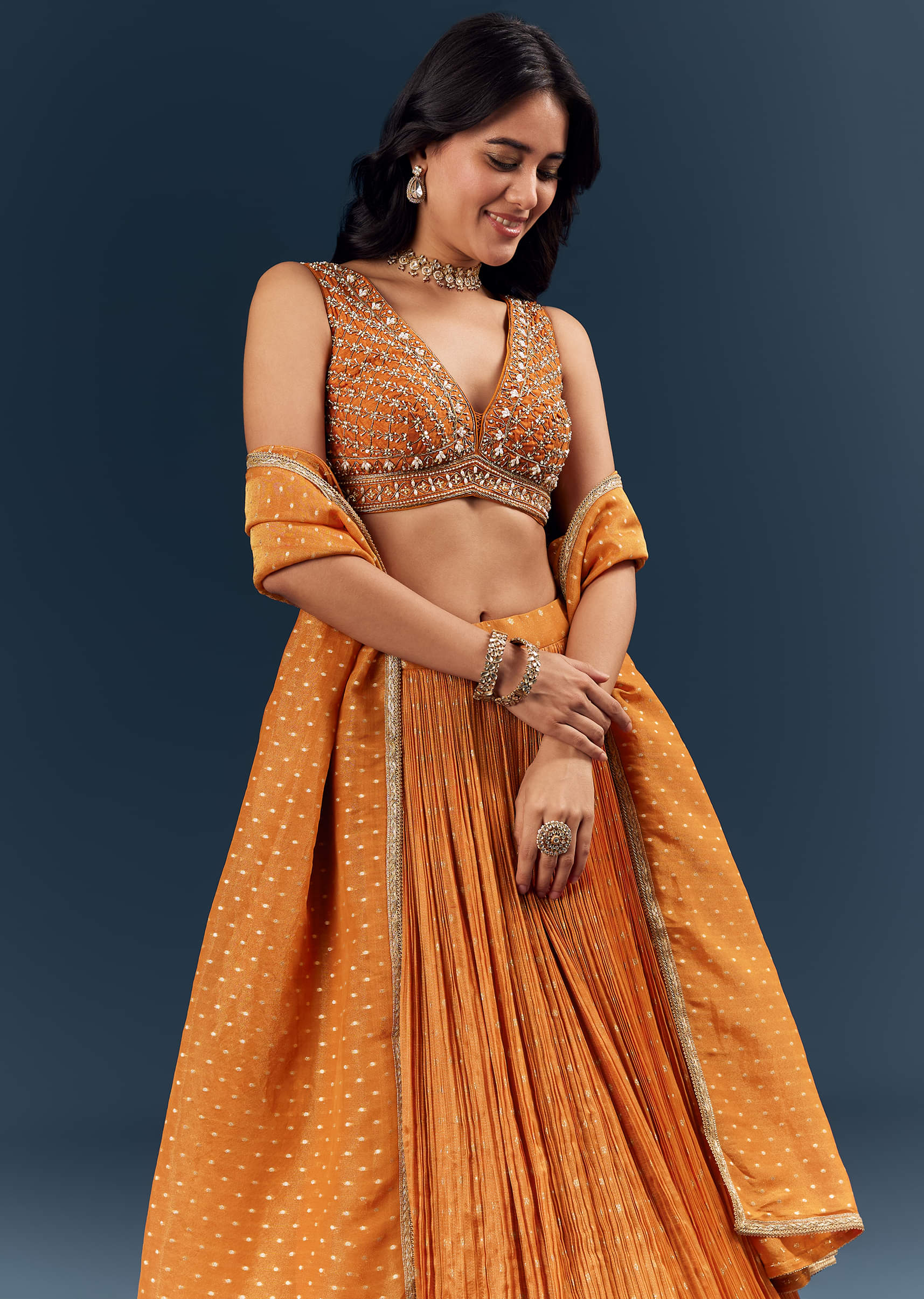 Orange Banarasi Silk Bridesmaid Lehenga With Intricate Hand Embroidery