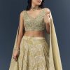Cream Banarasi Silk Bridesmaid Lehenga With Heavy Hand Embroidery