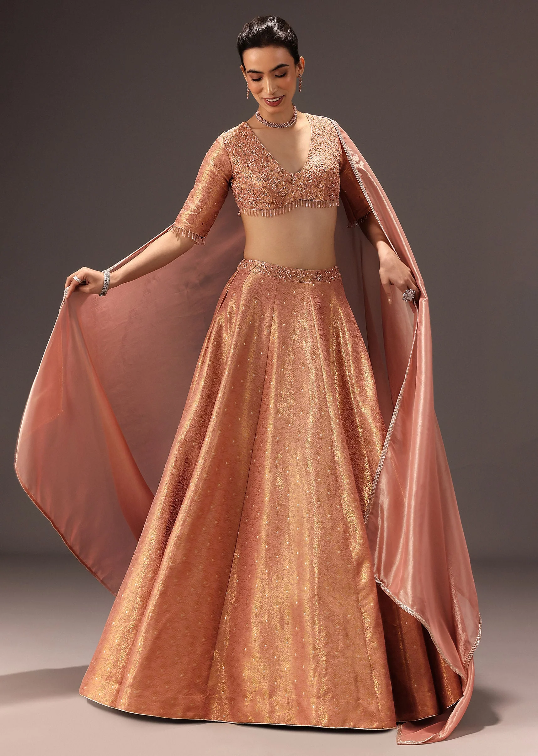 Dusty Peach Banarasi Silk Hand Work Lehenga Set