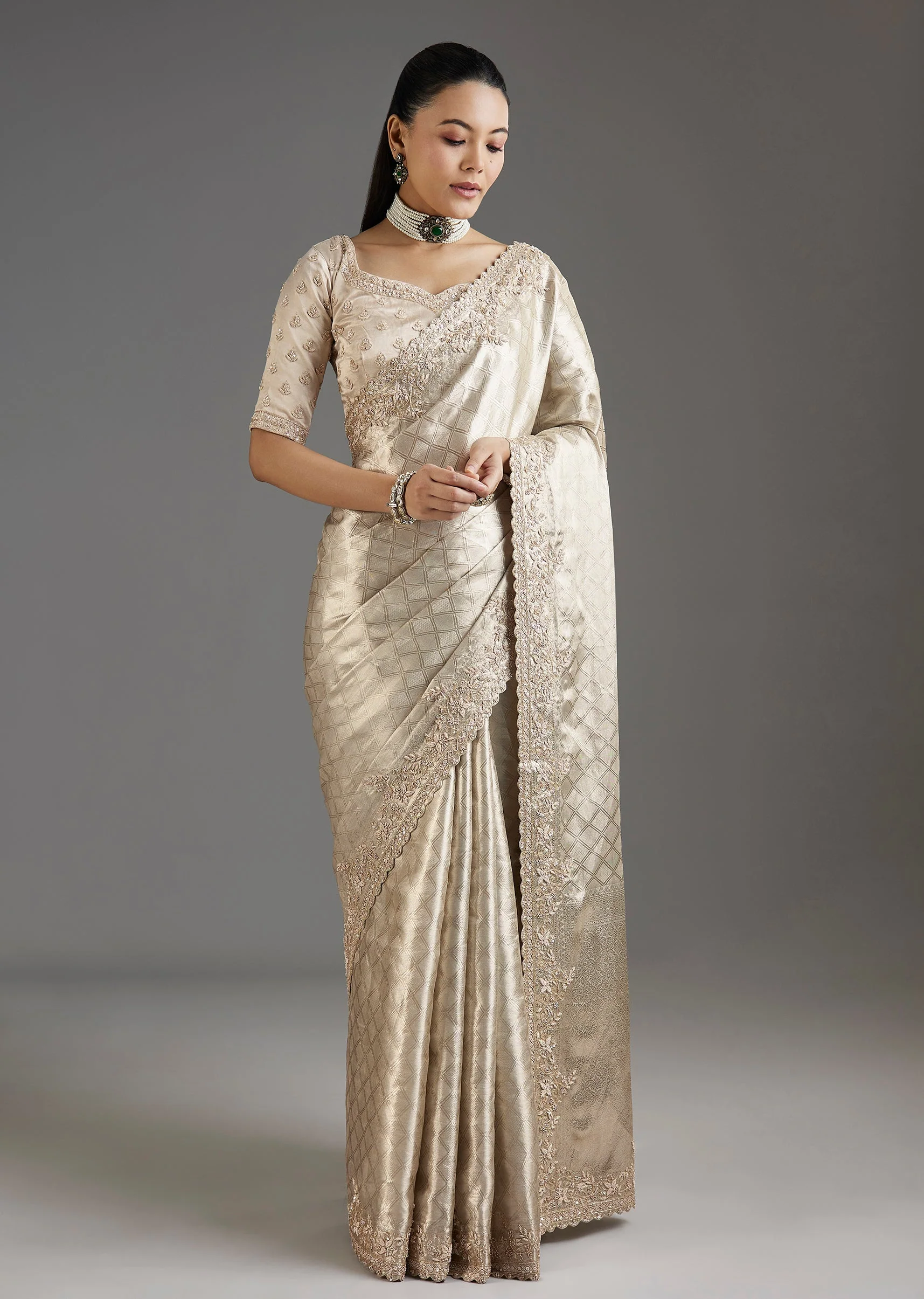 2305-ivory-gold-tissue-saree-with-embroidered-blouse-1.webp Ivory Gold Tissue Saree With Embroidered Blouse
