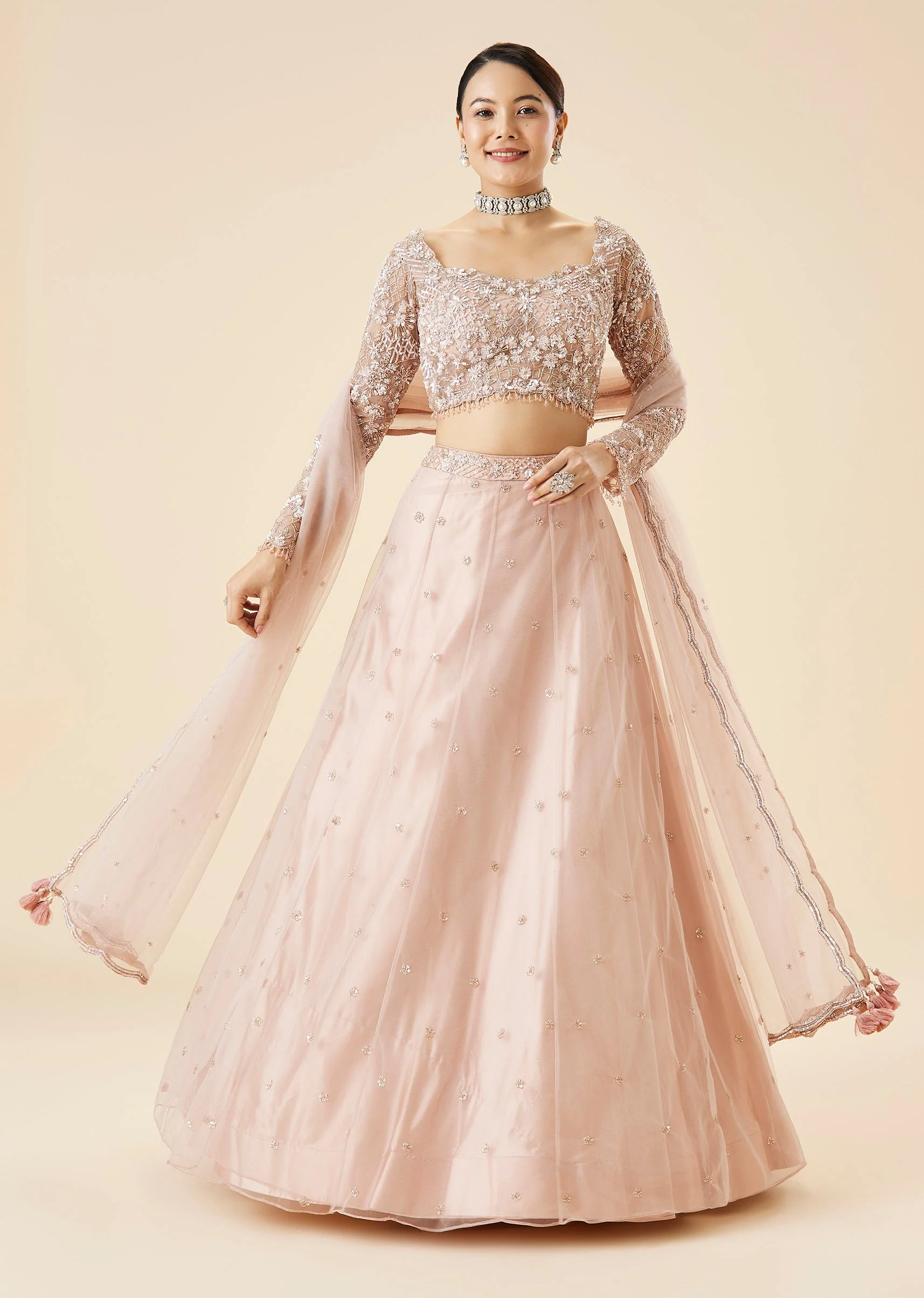 Peach Bridal Lehenga Set With Embroidered Motifs and Dupatta