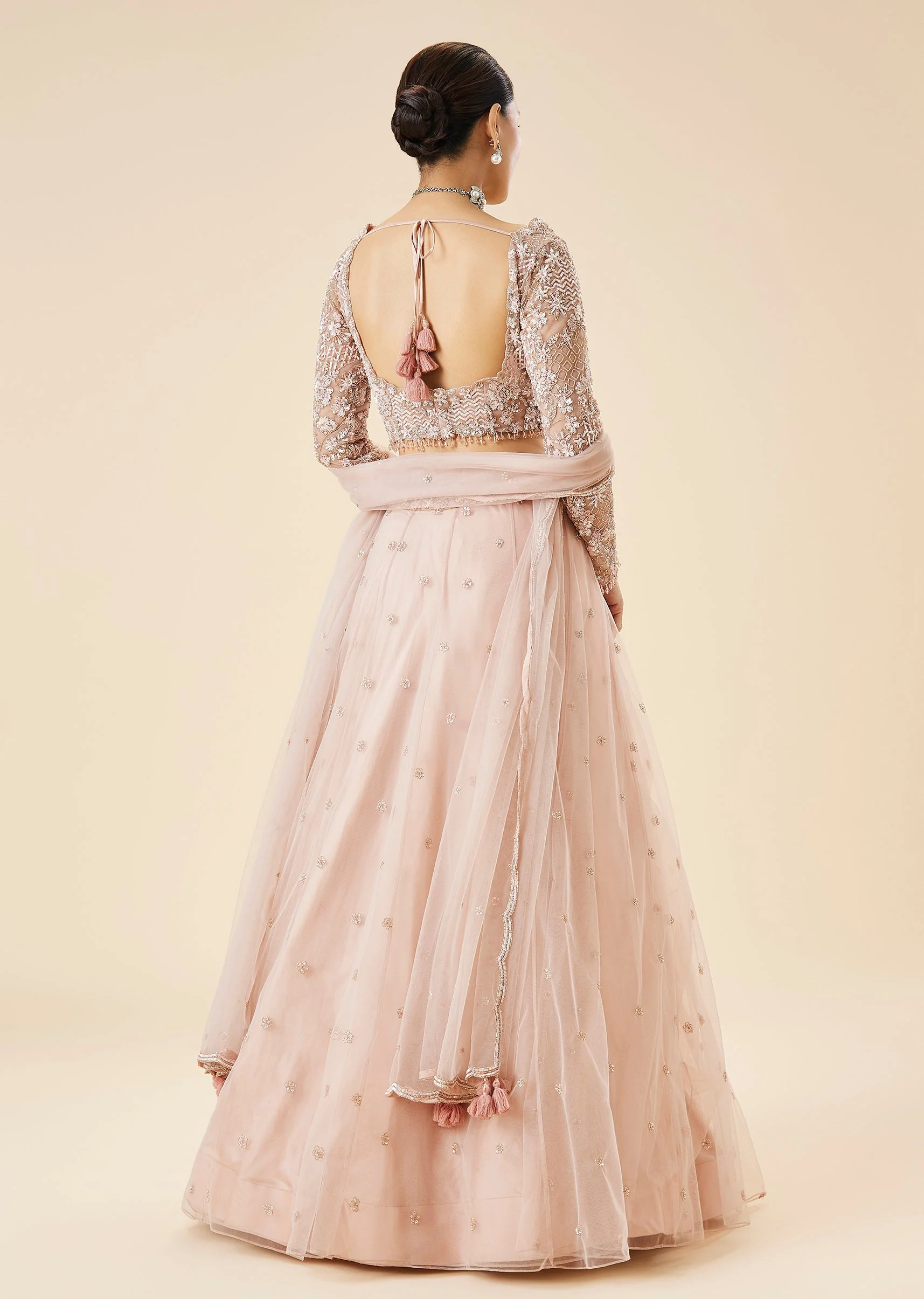 Peach Bridal Lehenga Set With Embroidered Motifs and Dupatta