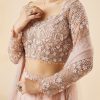 Peach Bridal Lehenga Set With Embroidered Motifs and Dupatta