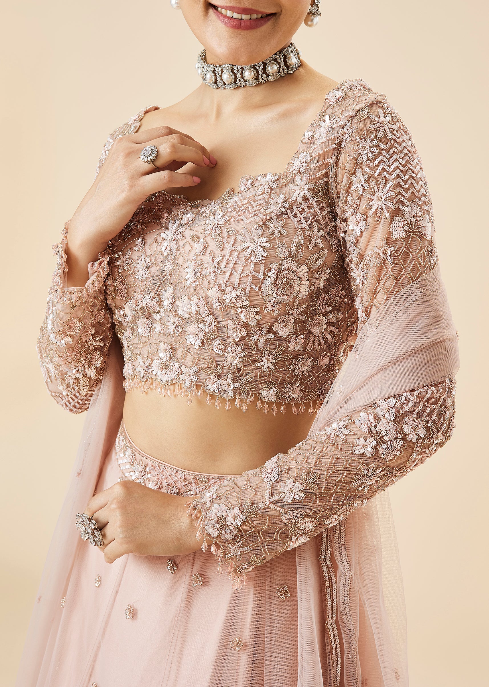 Peach Bridal Lehenga Set With Embroidered Motifs and Dupatta
