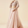 Peach Bridal Lehenga Set With Embroidered Motifs and Dupatta