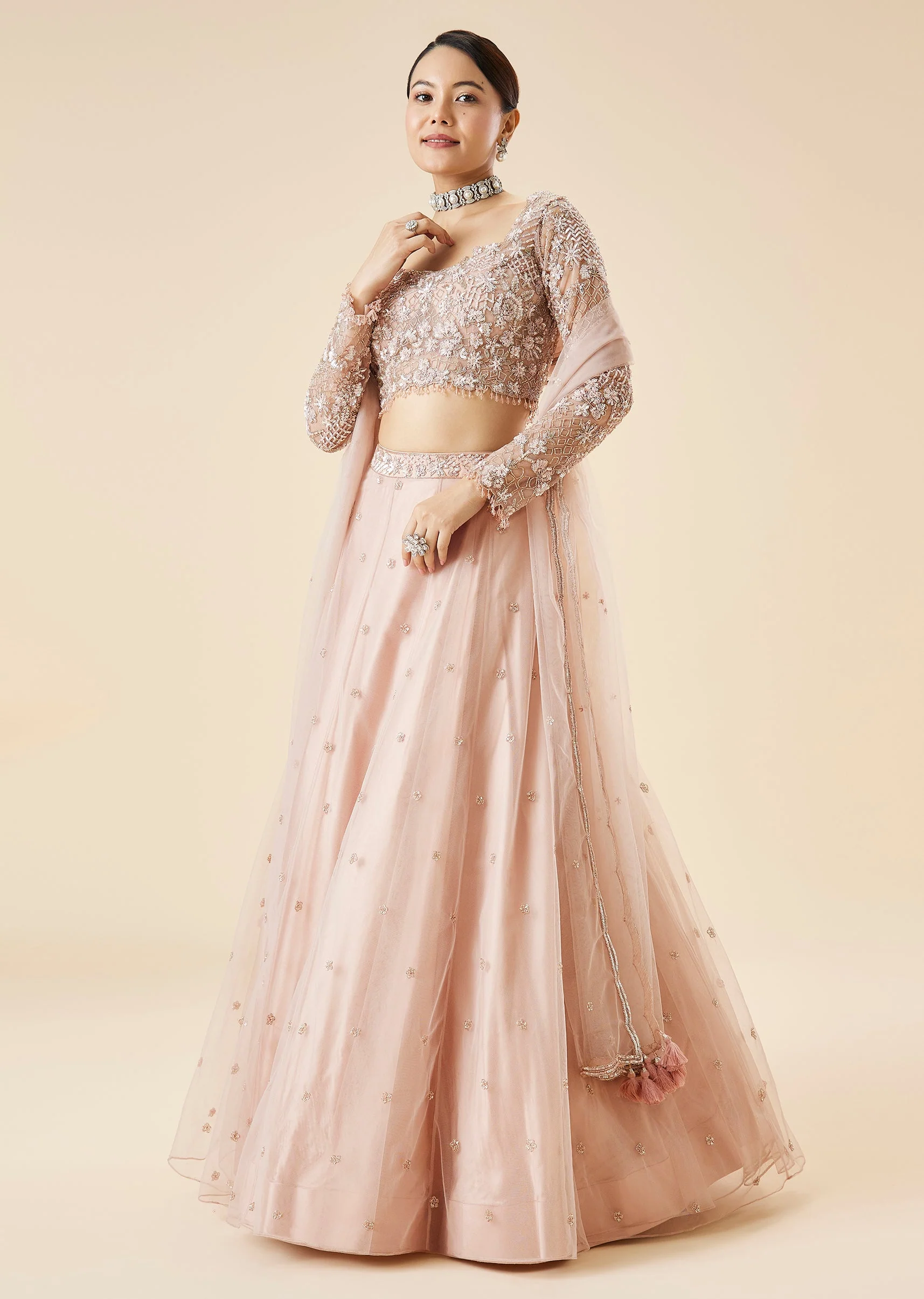 Peach Bridal Lehenga Set With Embroidered Motifs and Dupatta