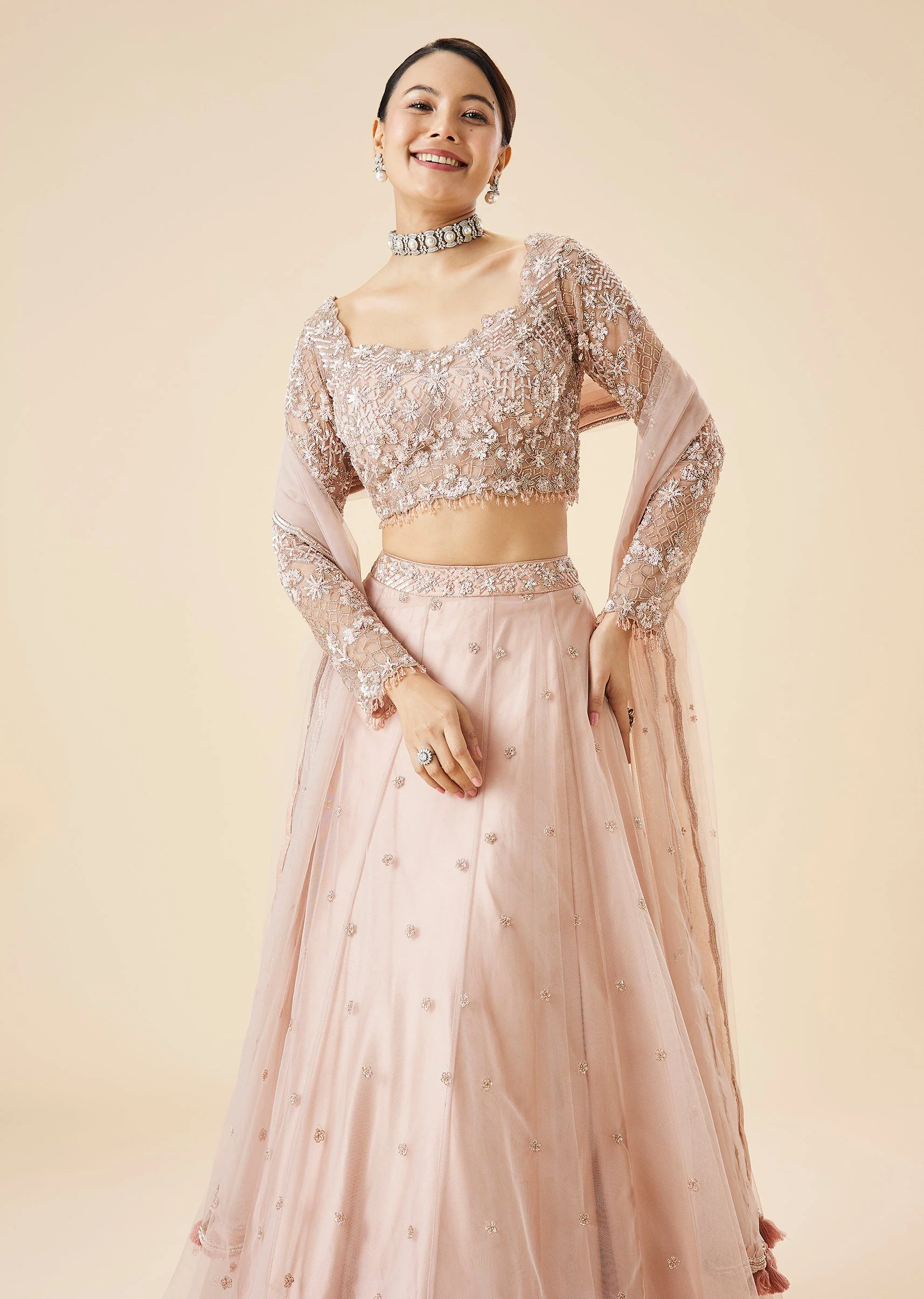 Peach Bridal Lehenga Set With Embroidered Motifs and Dupatta