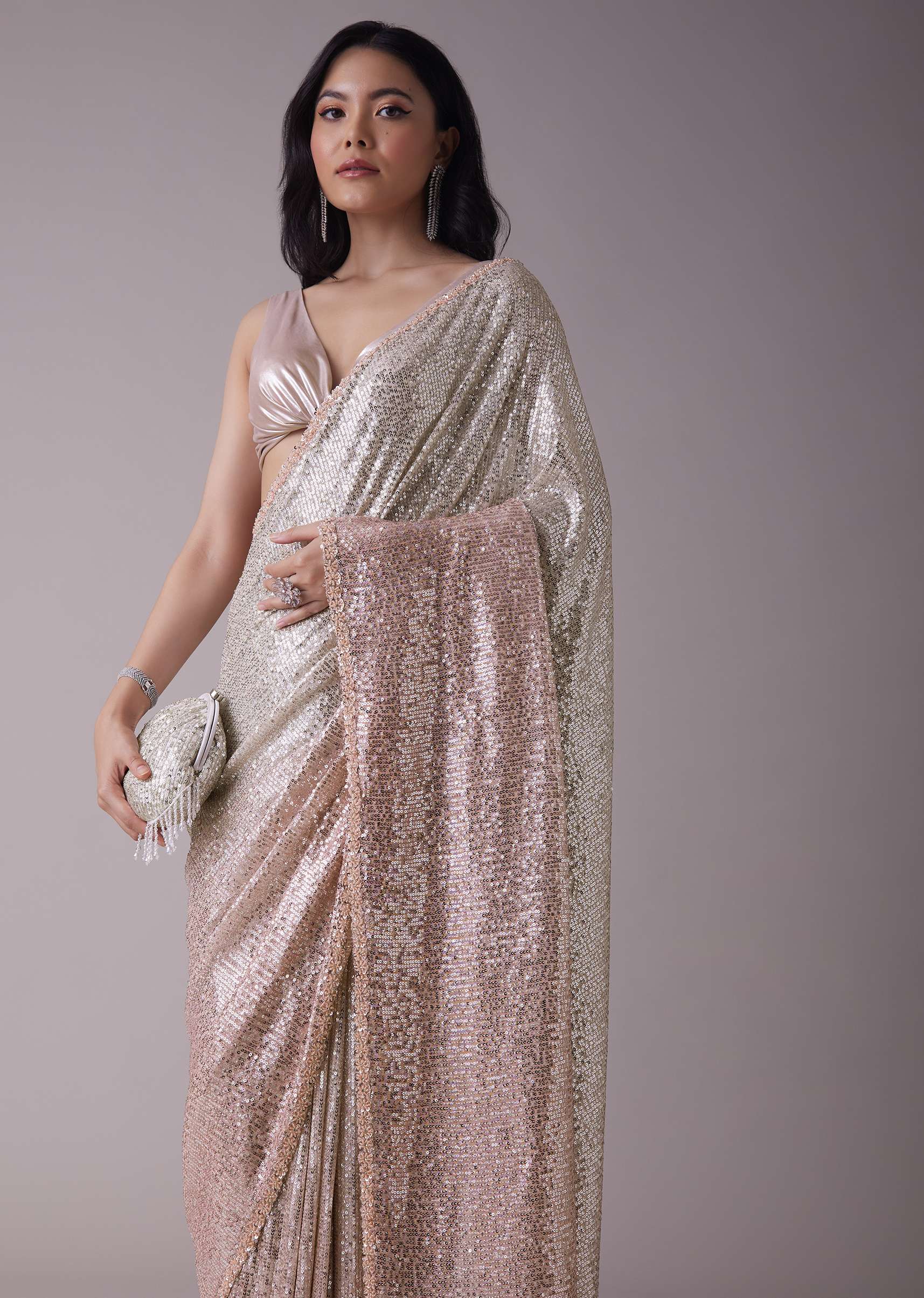 2752-peach-pink-and-silver-toned-sequins-saree-with-an-embellished-border-1.jpg Peach Pink And Silver Toned Sequins Saree With An Embellished Border