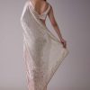 Peach Pink And Silver Toned Sequins Saree With An Embellished Border