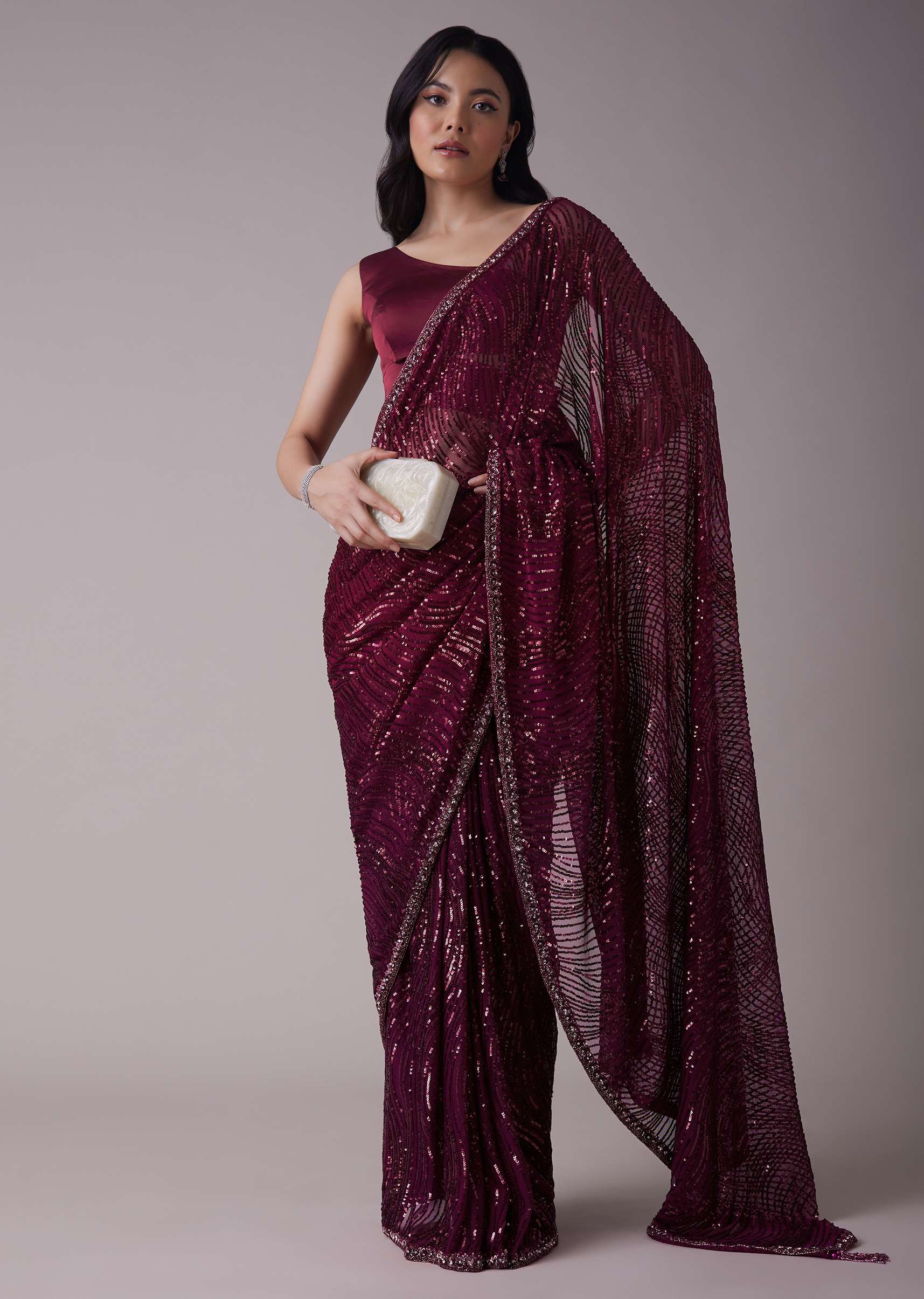 Wine Sequins Saree With An Embellished Border