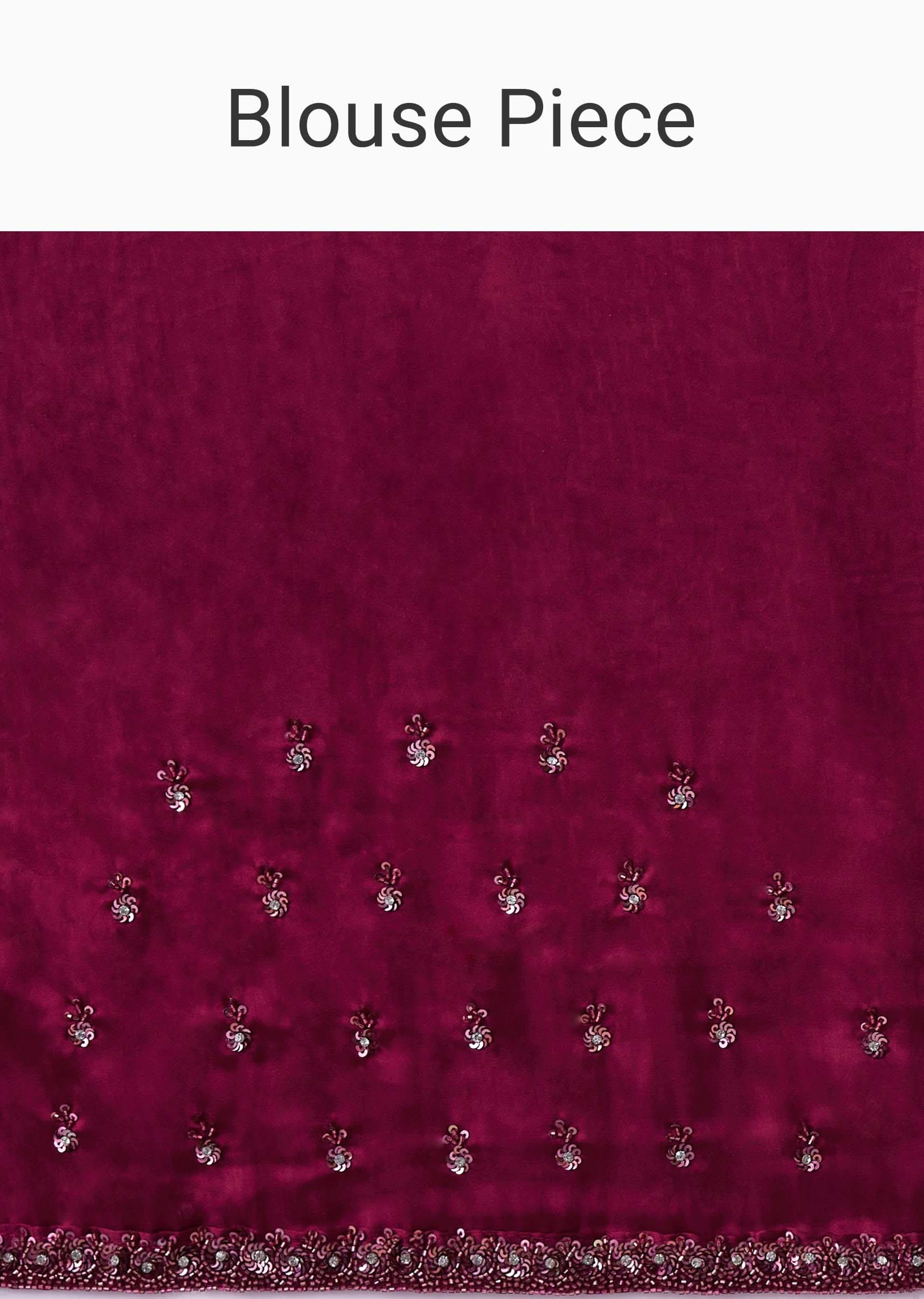 Wine Sequins Saree With An Embellished Border