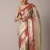 Gold Chanderi Kota Silk Woven Saree With Mirror Work And Unstitched Blouse Piece