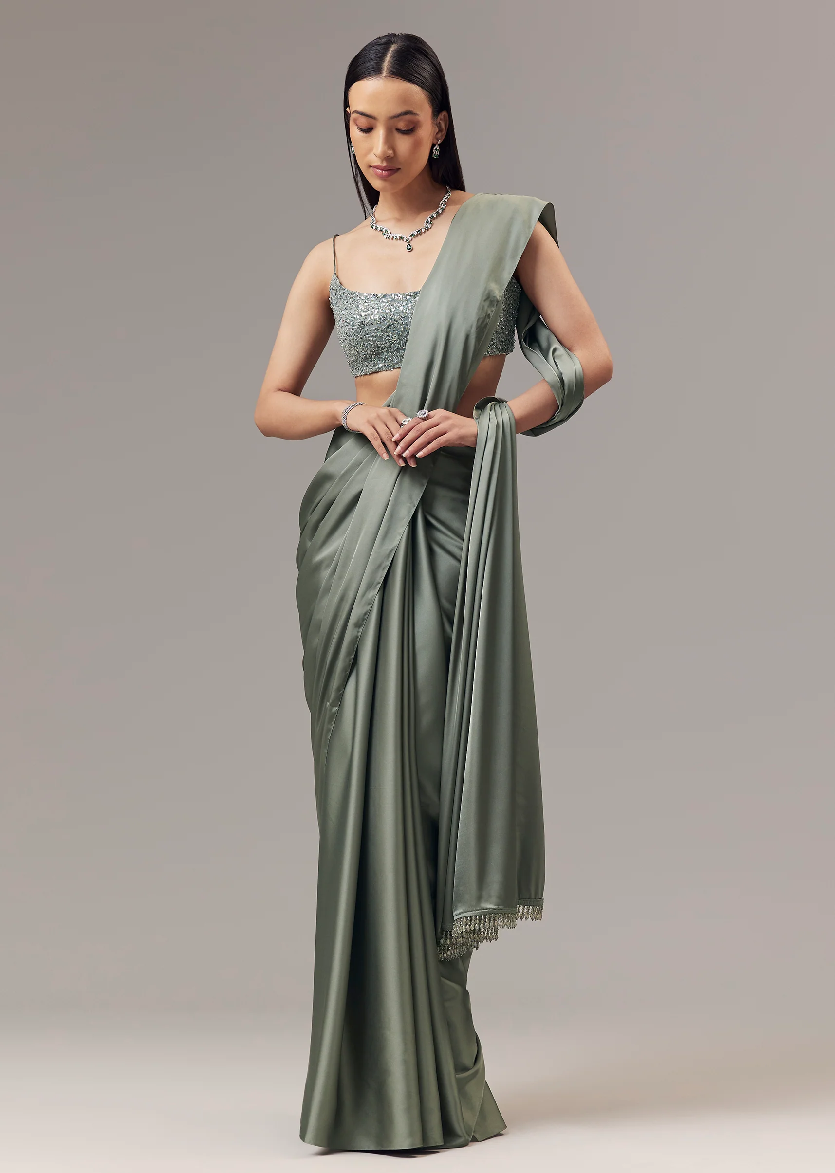 2934-green-satin-blend-saree-with-cut-dana-and-sequin-embellished-blouse-1.webp Green Satin Blend Saree With Cut Dana And Sequin Embellished Blouse
