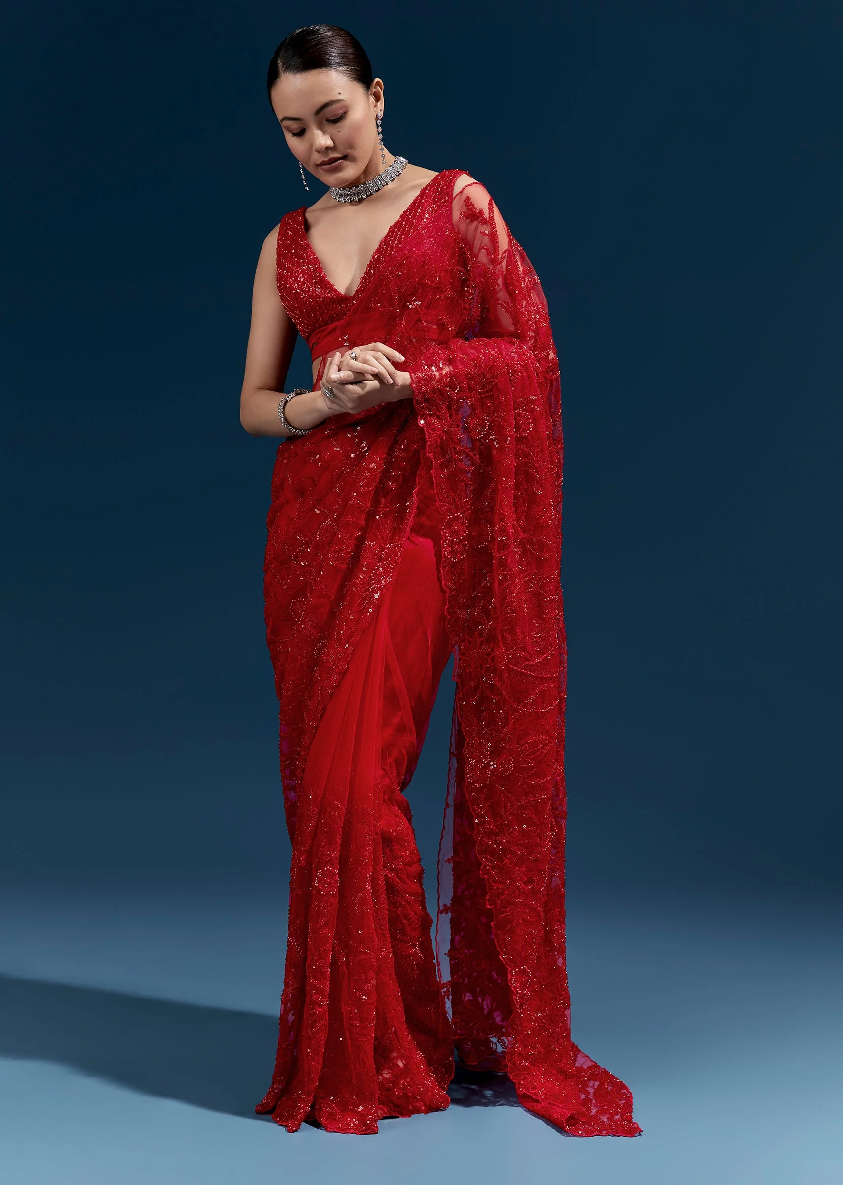 3105-red-heavy-embroidered-net-saree-with-cutwork-border-and-all-over-floral-jaal-1.webp Red Heavy Embroidered Net Saree With Cutwork Border And All Over Floral Jaal