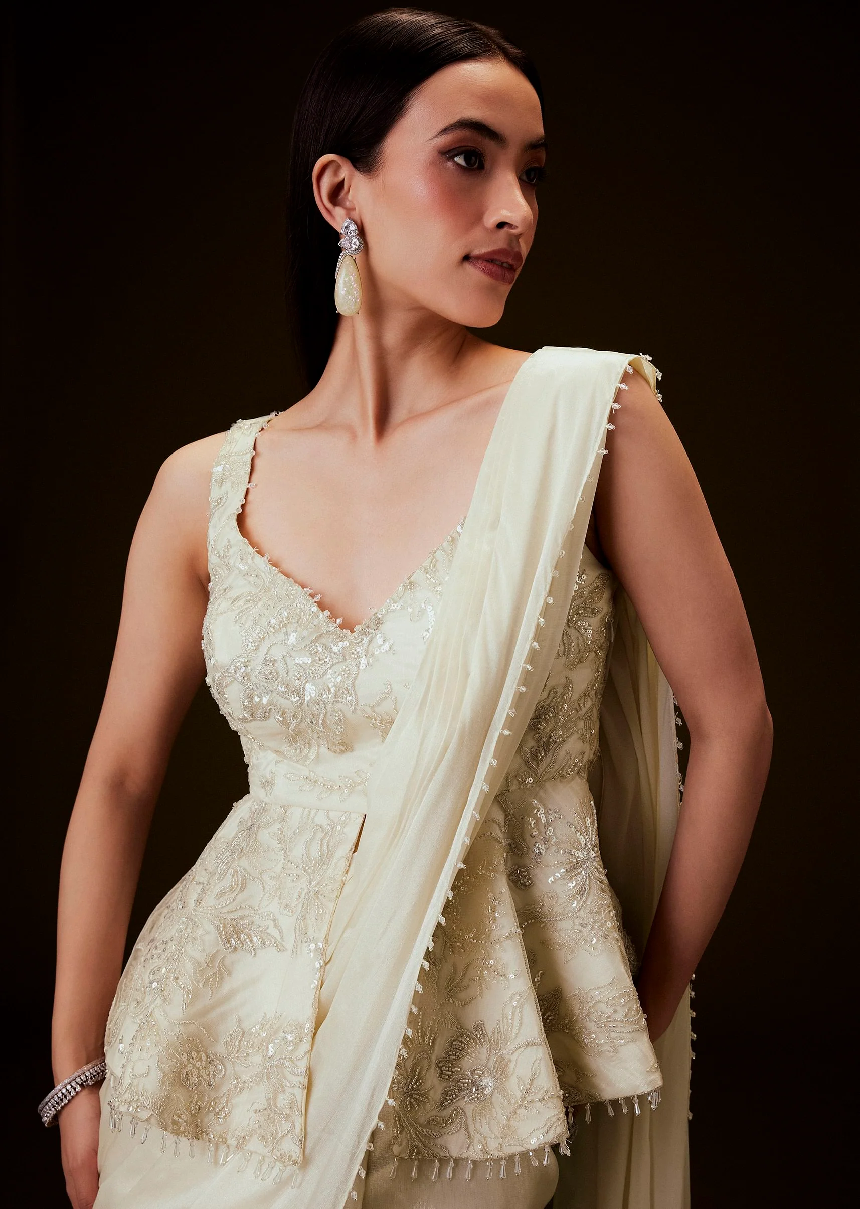 Ivory Embroidered Peplum Top With Saree