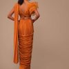 Rust Orange Saree With Fancy Ruffle Blouse And Embroidered Belt
