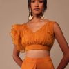 Rust Orange Saree With Fancy Ruffle Blouse And Embroidered Belt