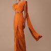 Rust Orange Saree With Fancy Ruffle Blouse And Embroidered Belt