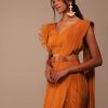 Rust Orange Saree With Fancy Ruffle Blouse And Embroidered Belt