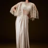 Off White Corset Gown With Sheer Waistline And Embroidered Cape