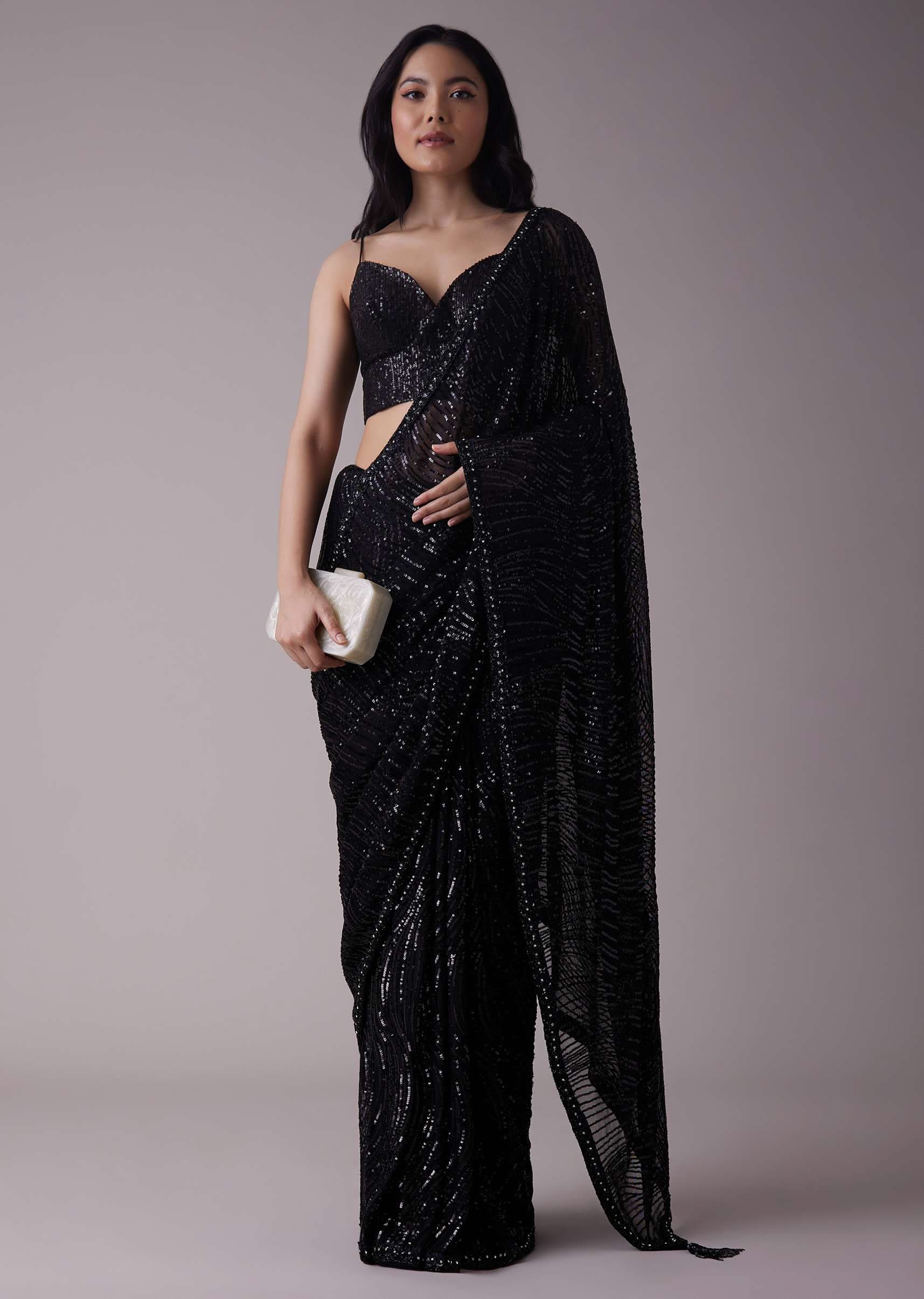 3604-shimmery-black-sequins-saree-with-an-embellished-border-1.jpg Shimmery Black Sequins Saree With An Embellished Border