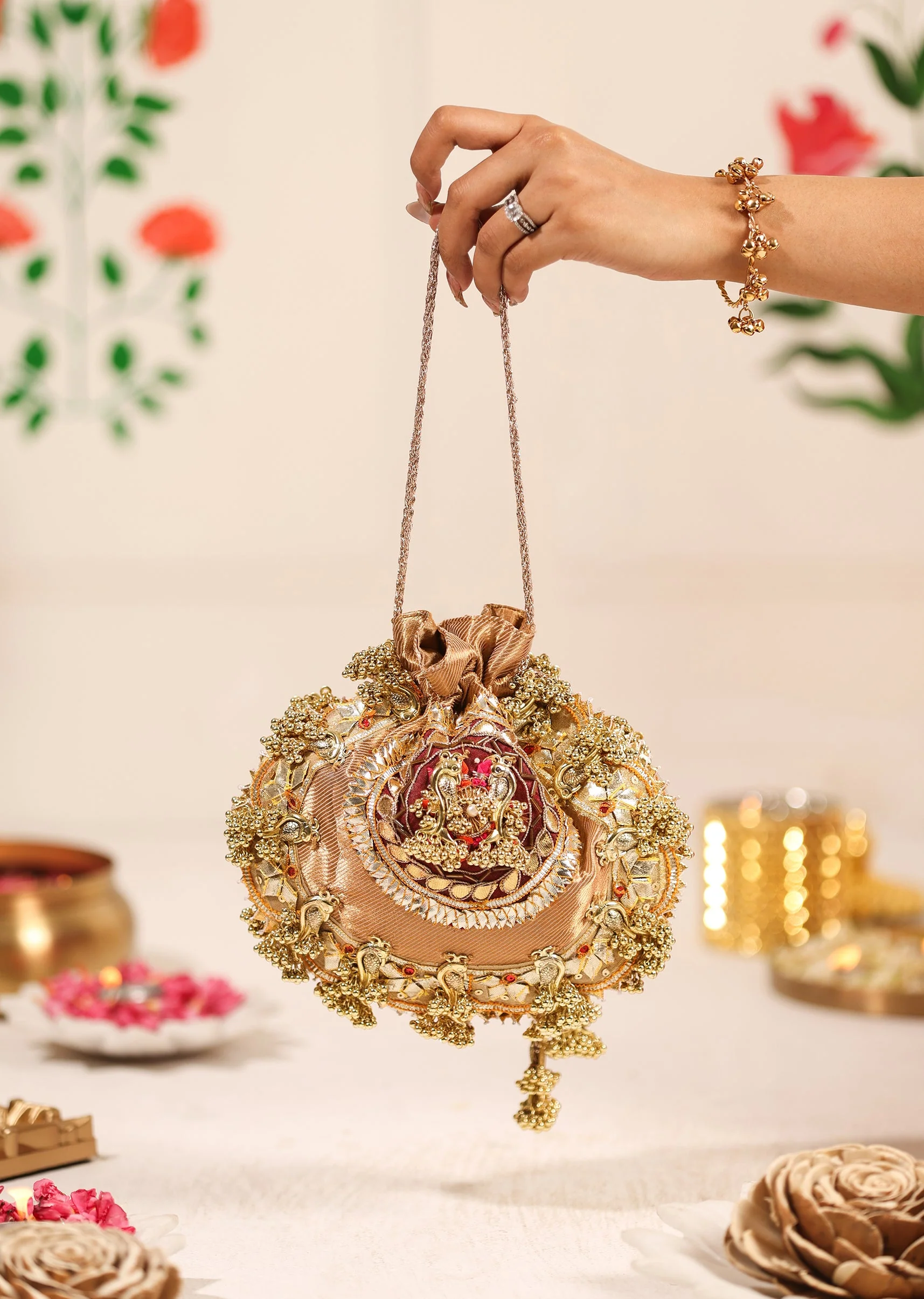 365-gold-brocade-embellished-potli-1.webp Gold Brocade Embellished Potli