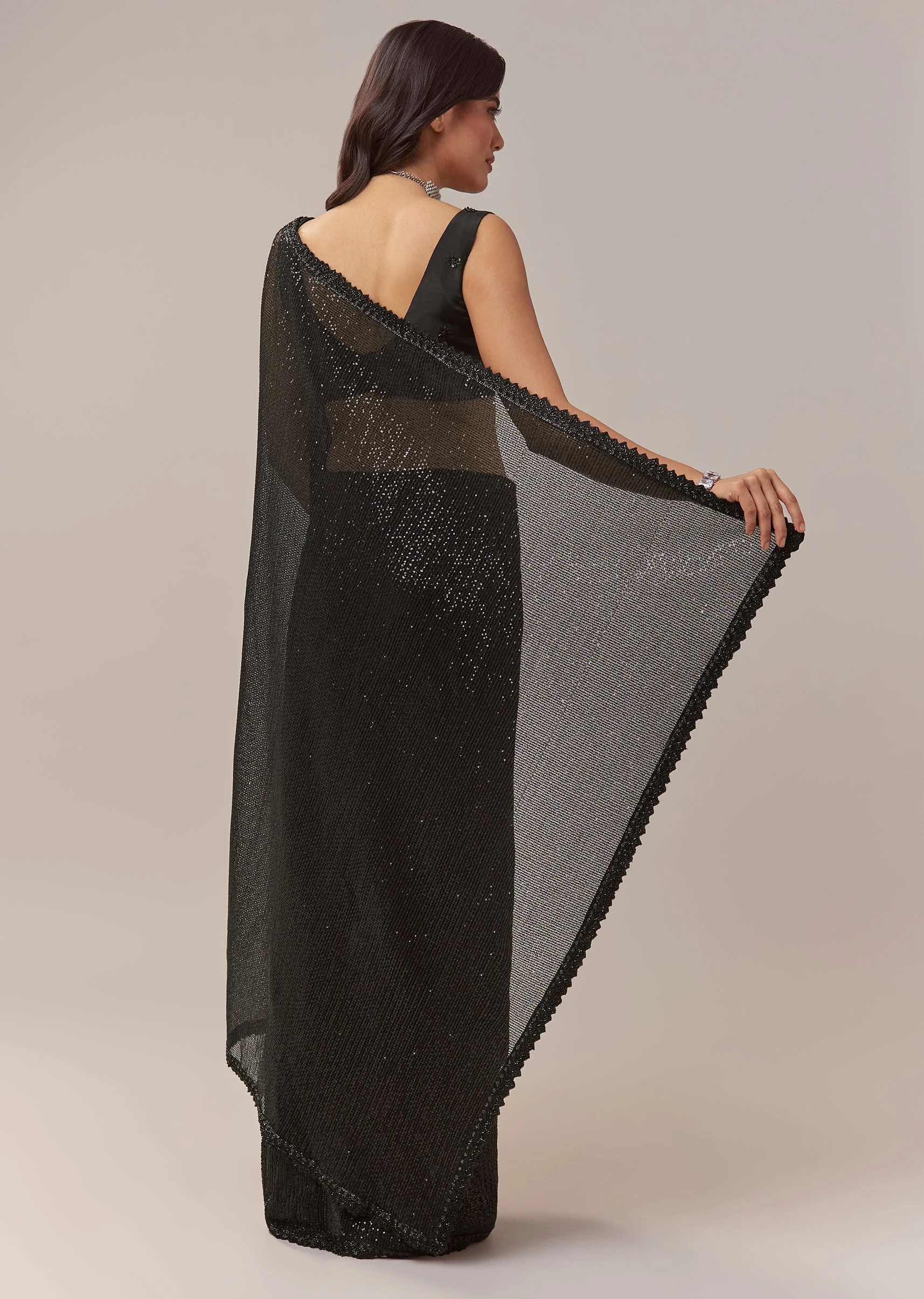 Black Net Saree With Linear Sequins And Hand Embroidered Border