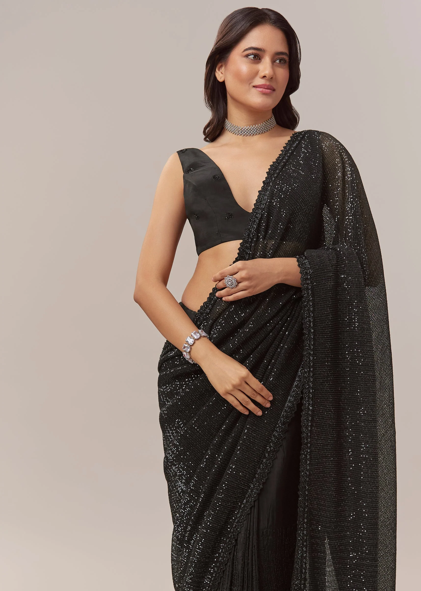 Black Net Saree With Linear Sequins And Hand Embroidered Border