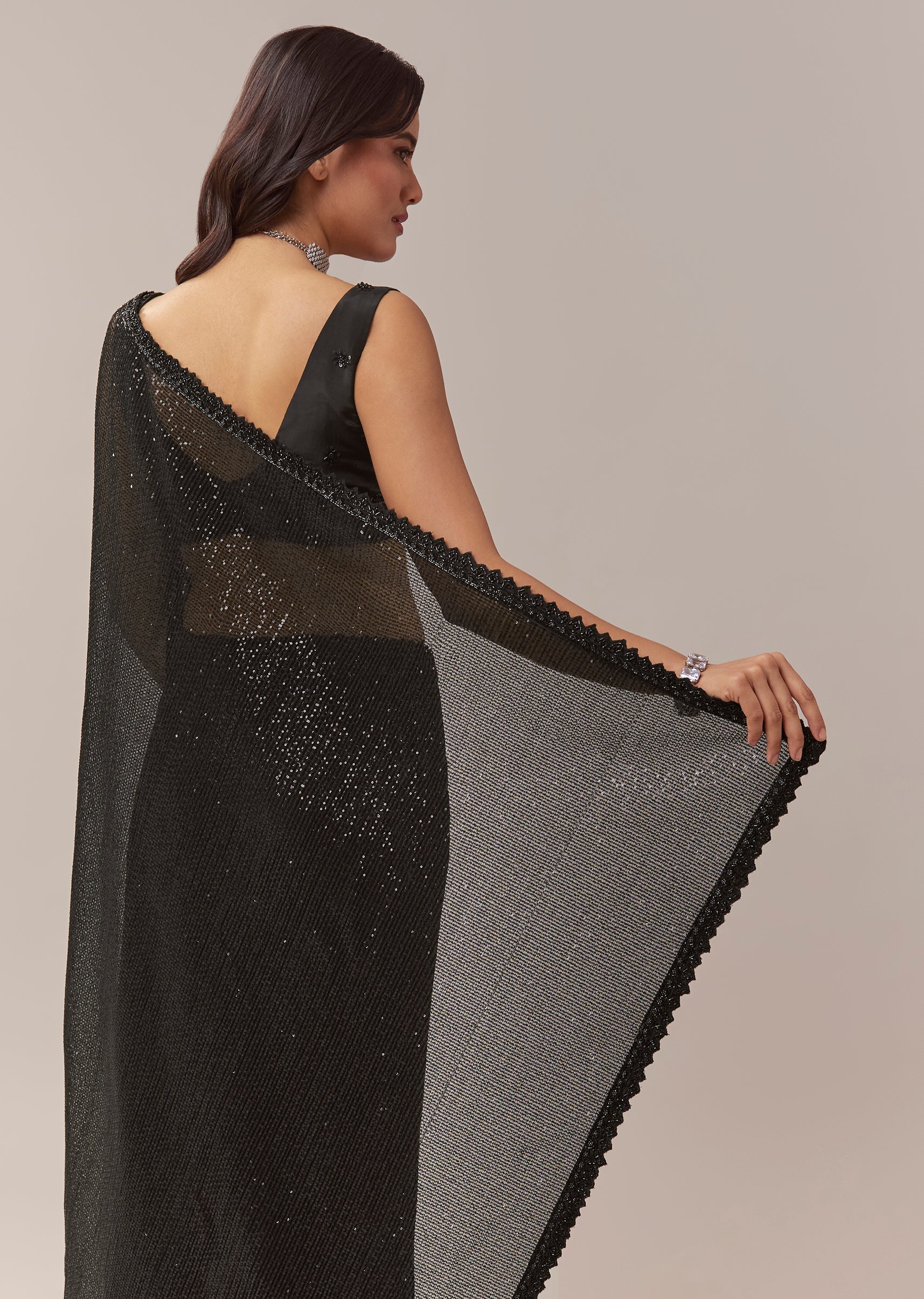 Black Net Saree With Linear Sequins And Hand Embroidered Border