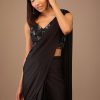 Black Satin Saree With Hand Embroidered Blouse With Fringes On The Hem