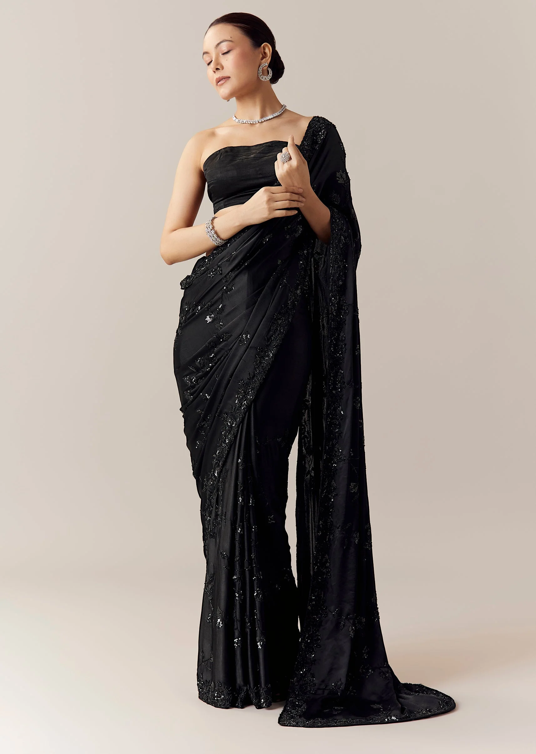 3792-black-floral-motif-cutdana-embellished-saree-with-unstitched-blouse-1.webp Black Floral Motif Cutdana Embellished Saree with Unstitched Blouse