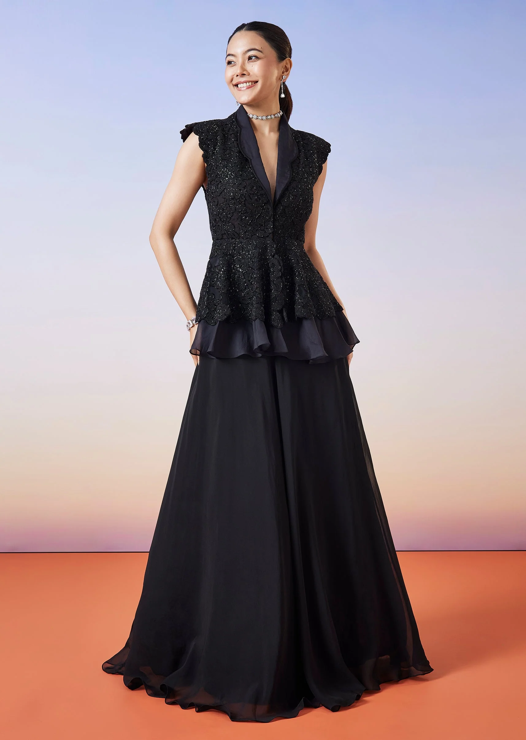 4237-black-organza-peplum-jacket-crop-skirt-lehenga-1.webp Black Organza Peplum Jacket Crop Skirt Lehenga