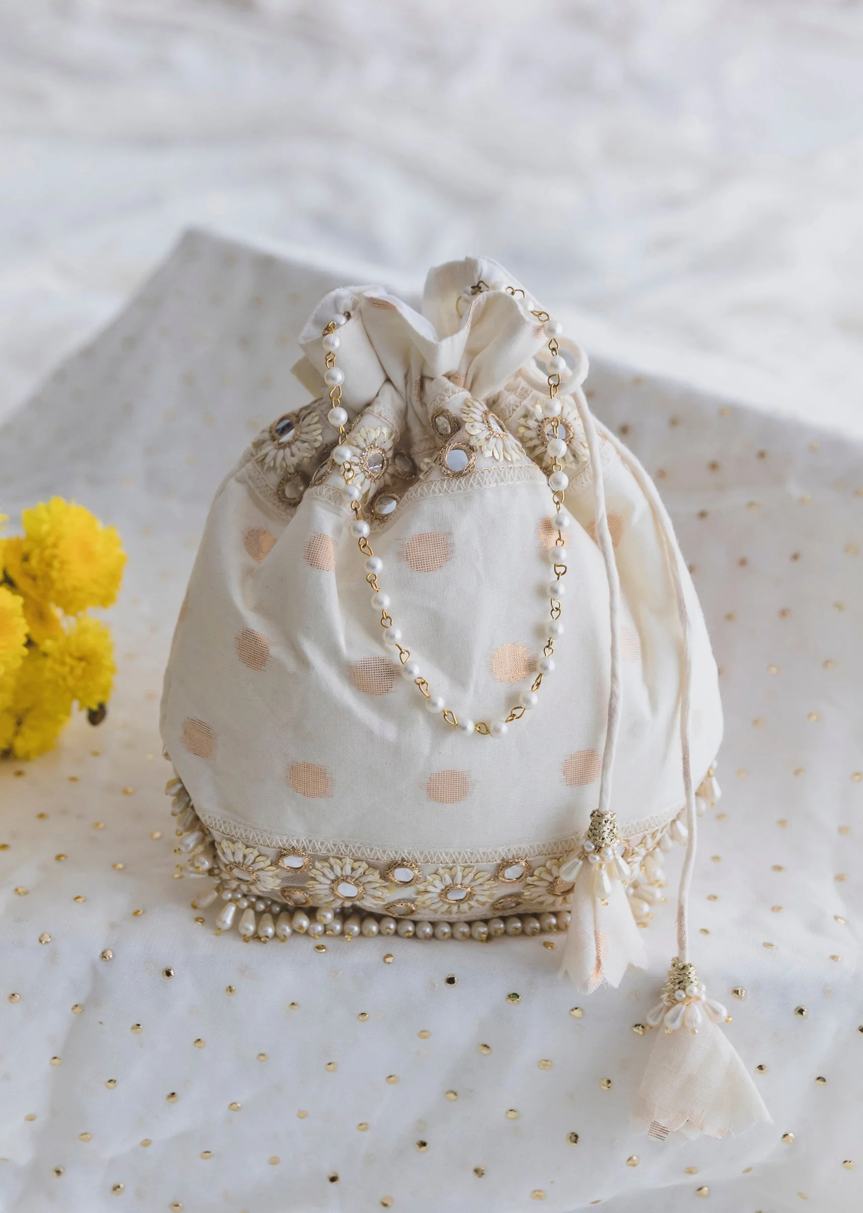 Cream Cotton Potli With Embroidery And Mirror Work