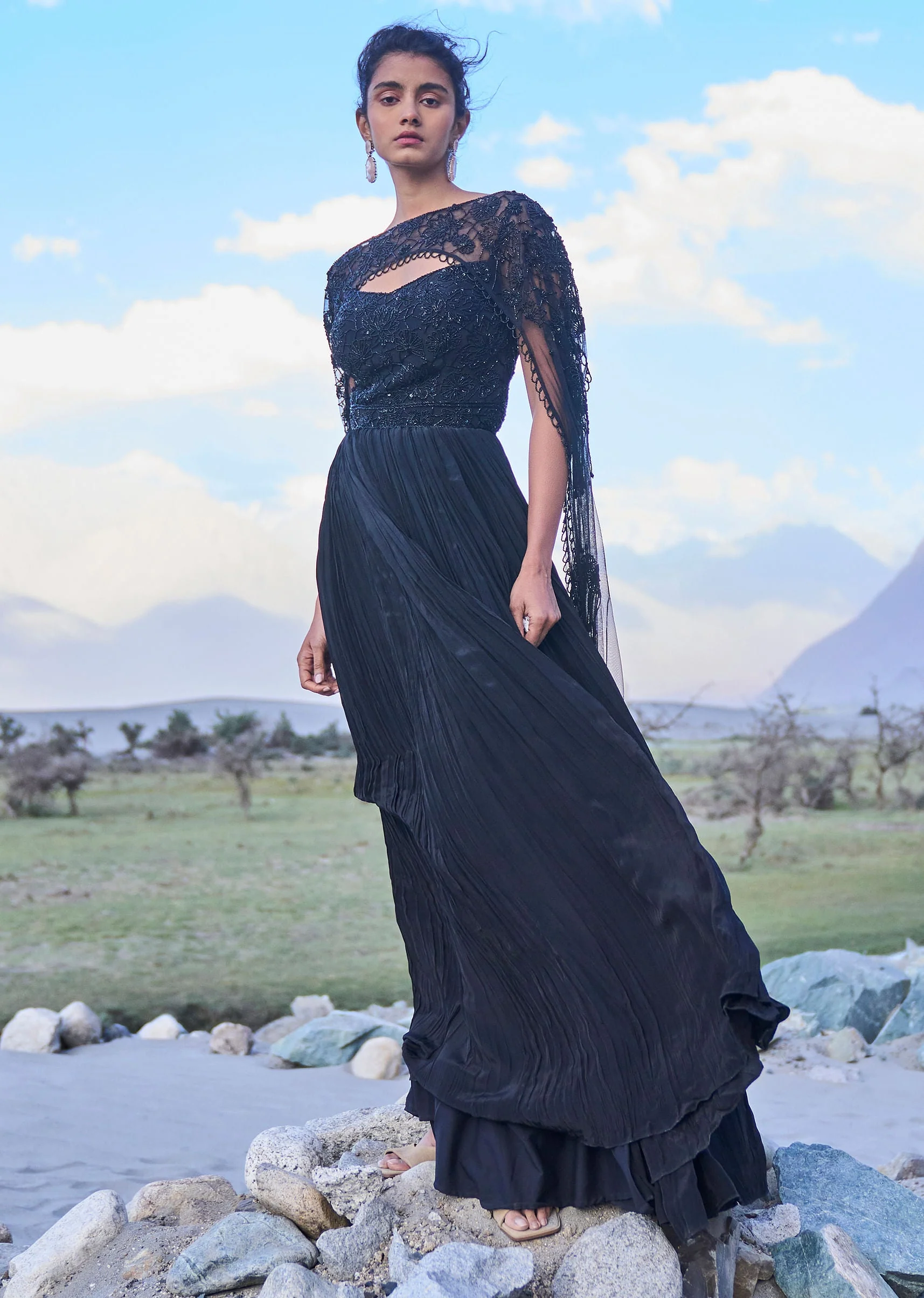 4305-black-embroidered-crepe-rushed-gown-with-cape-1.webp Black Embroidered Crepe Rushed Gown With Cape