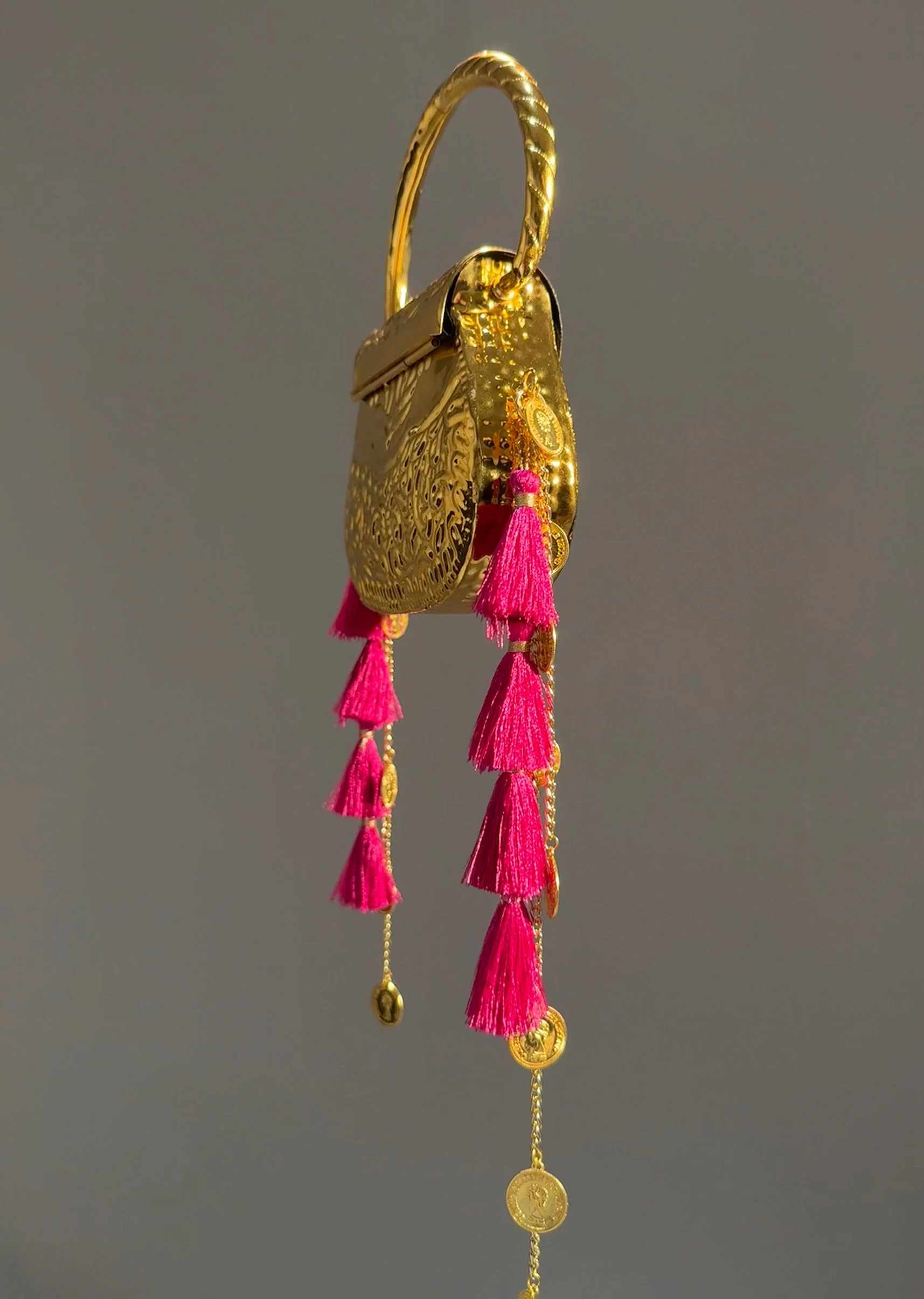 Gold Embossed Potli Handle Bag