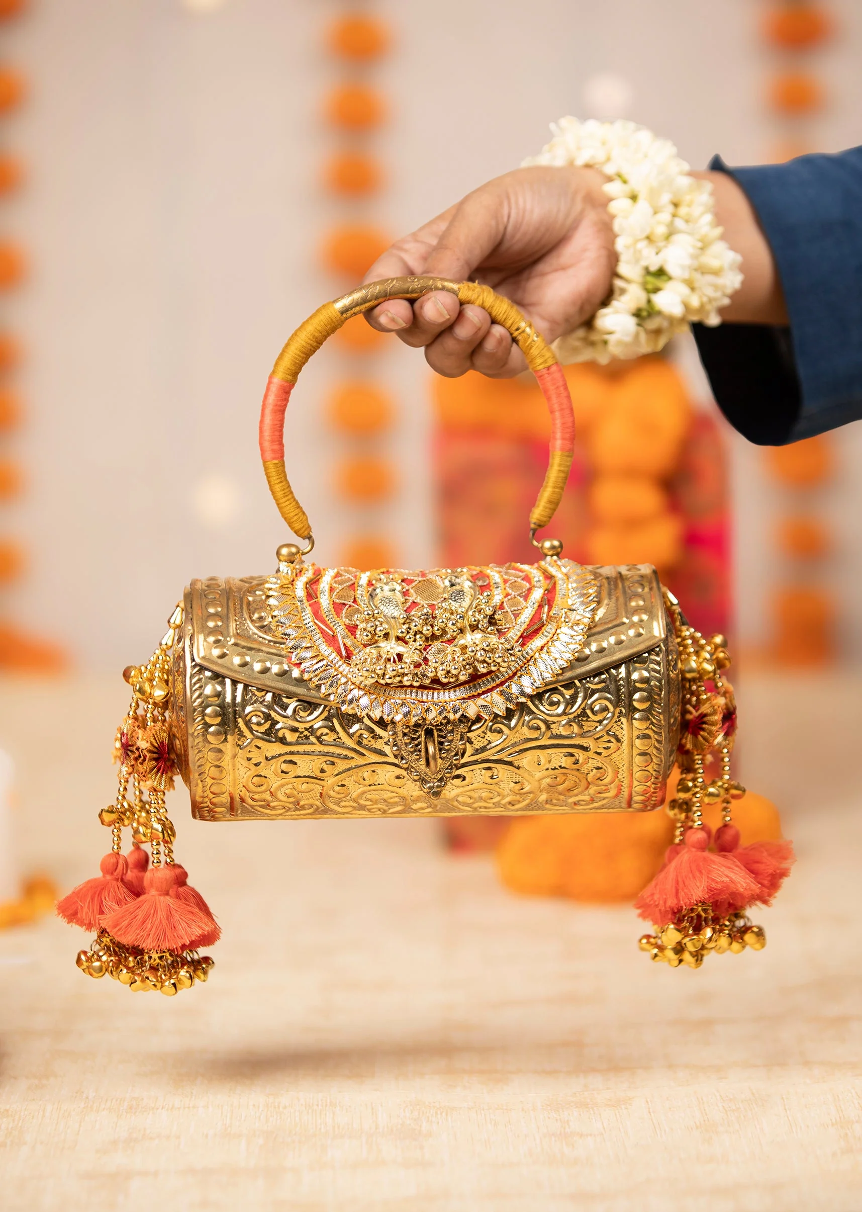 Silver and Gold Embossed Textured Metal Bag with Tassels