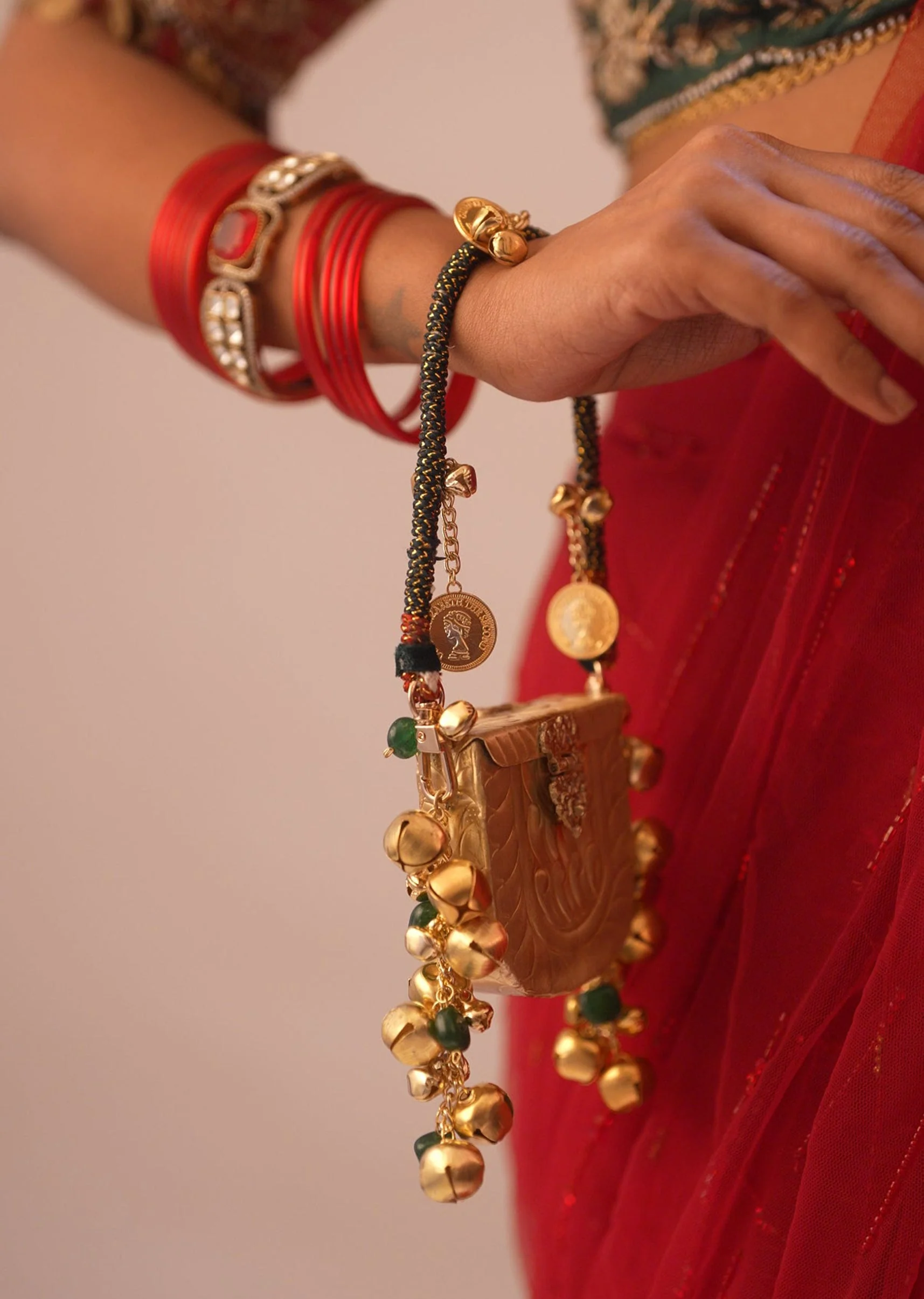 Mini Gold Motif Potli Bag