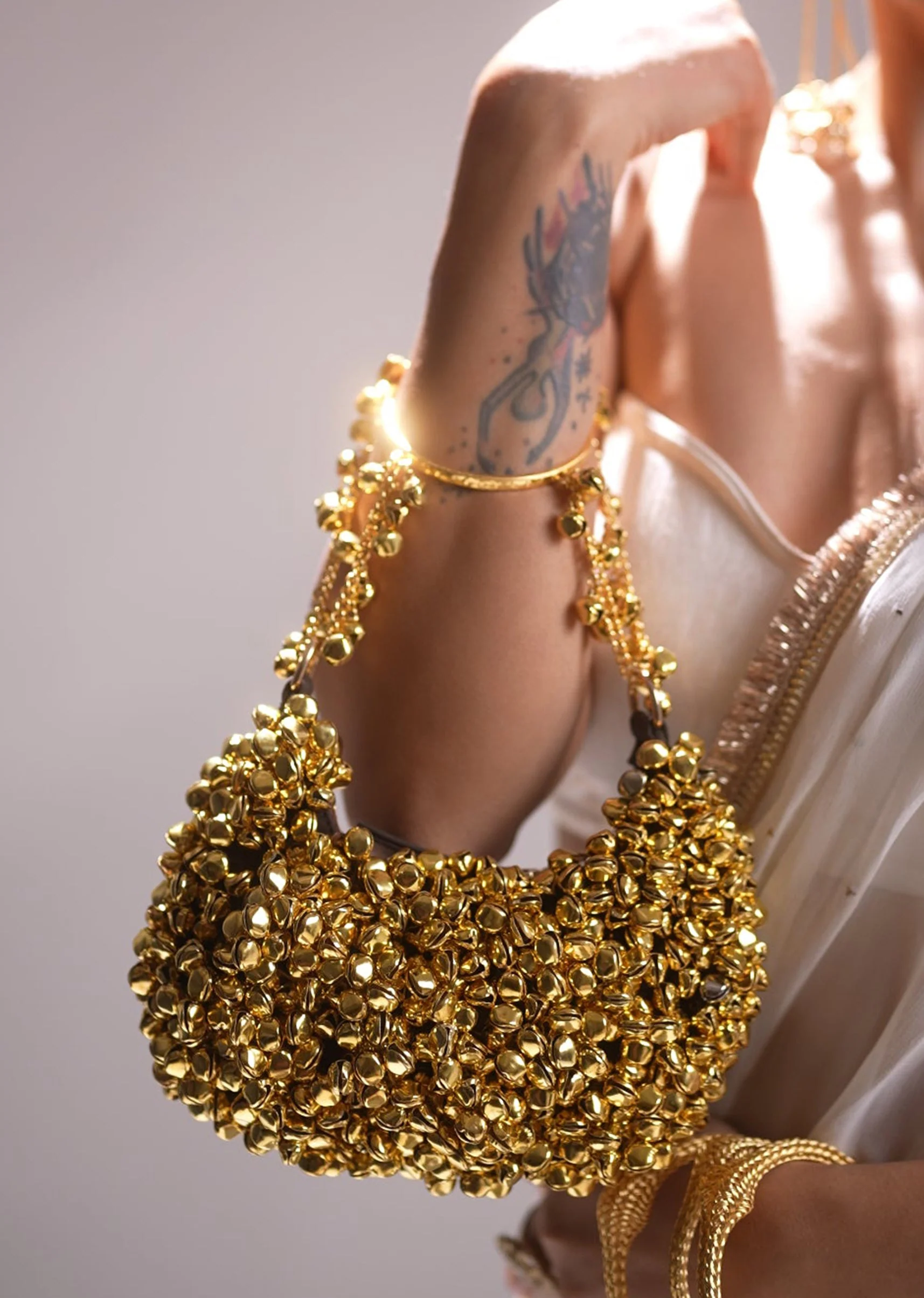 Gold Ghungroo Embellished Potli Bag
