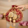 Maroon and Gold Silk Peacock Motif Embroidered Potli Bag