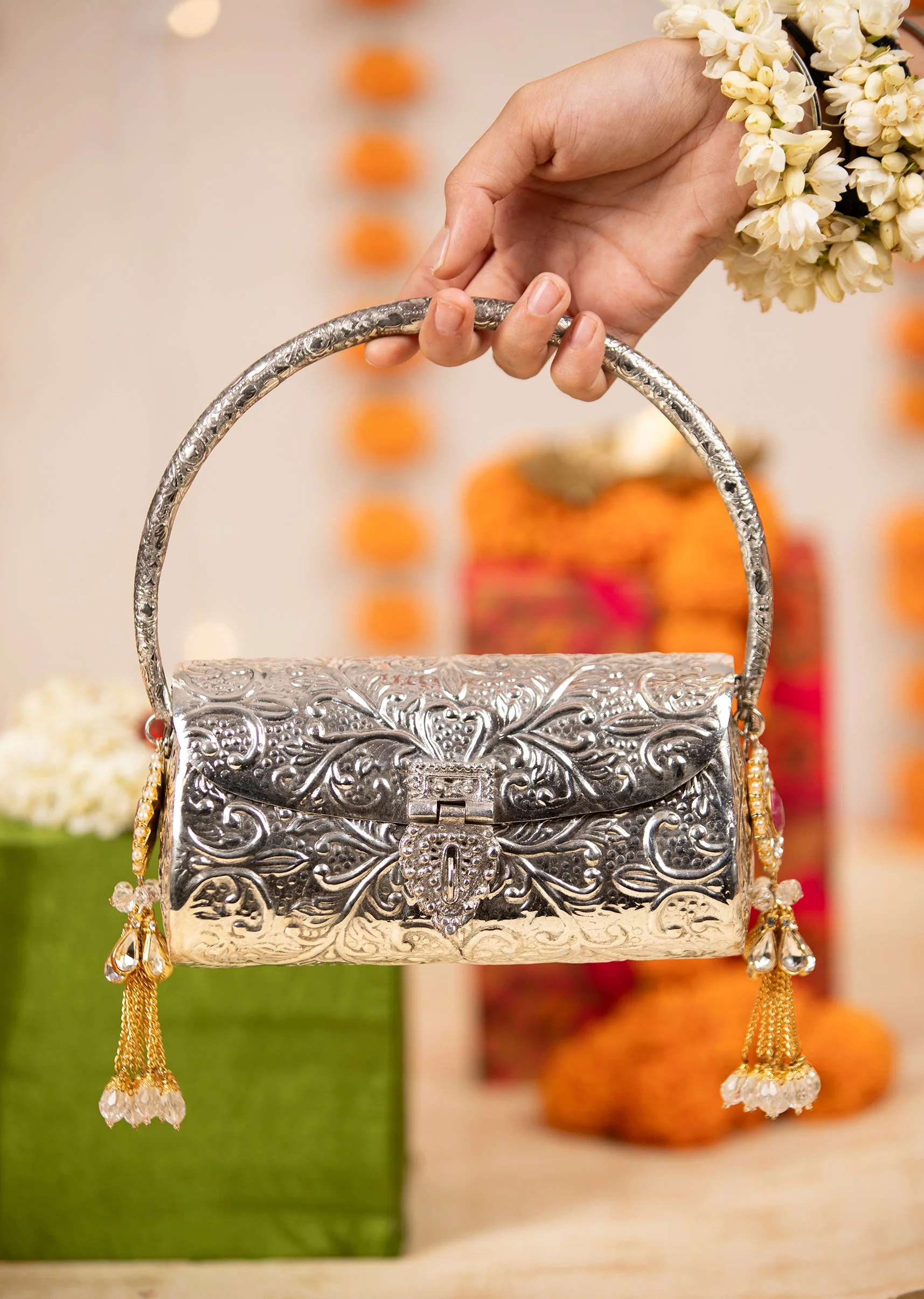 460-silver-floral-embossed-textured-metal-bag-1.webp Silver Floral Embossed Textured Metal Bag