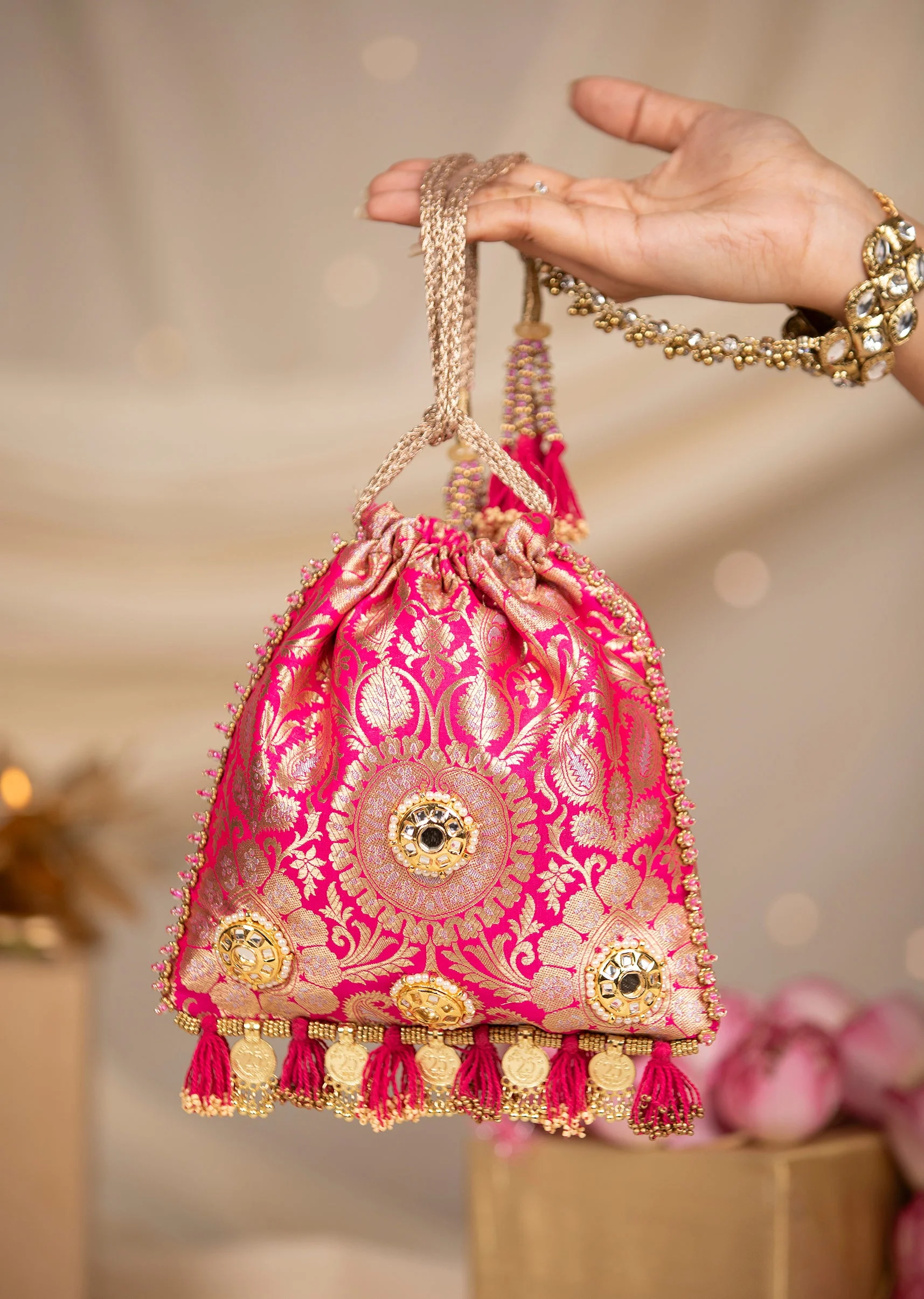 466-pink-silk-mirror-embellished-tassel-potli-bag-1.webp Pink Silk Mirror Embellished Tassel Potli Bag