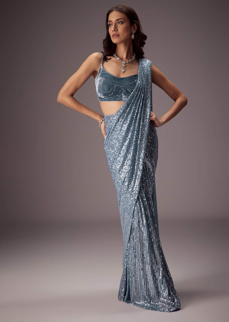 4707-steel-blue-sequin-saree-paired-with-a-plush-velvet-blouse-1.jpg Steel Blue Sequin Saree Paired With A Plush Velvet blouse